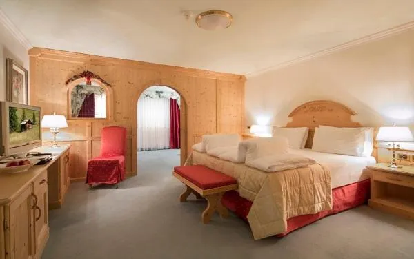 Bed in Hotel Sassongher