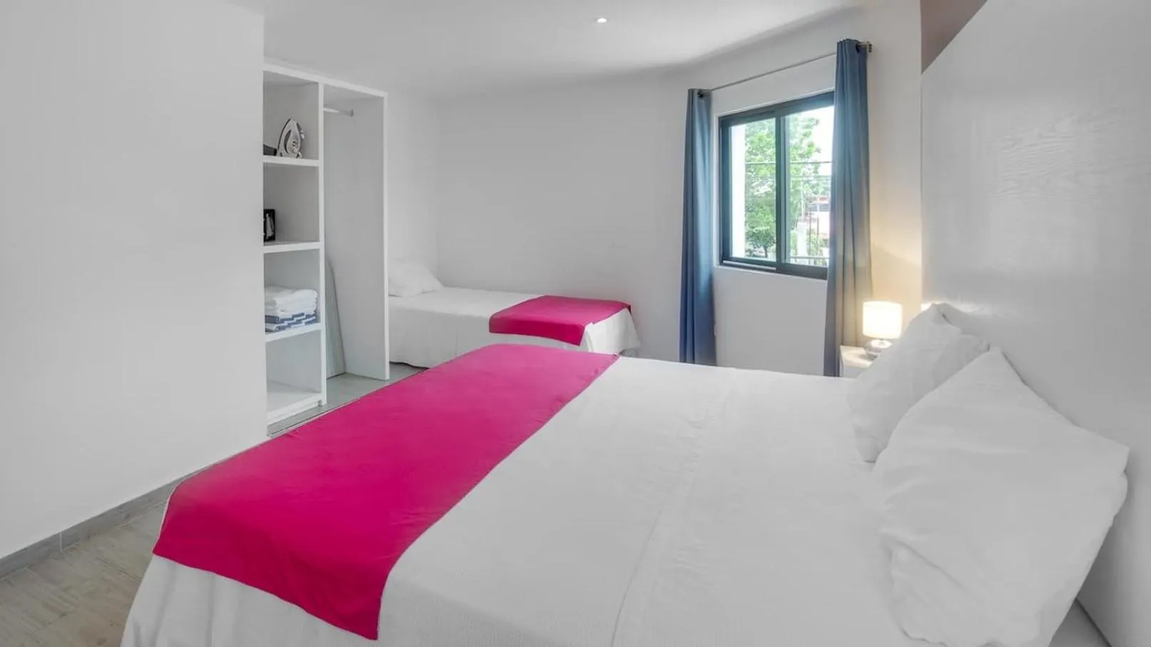 Bed in Valentina Suites by Las Flores Vacation Rentals