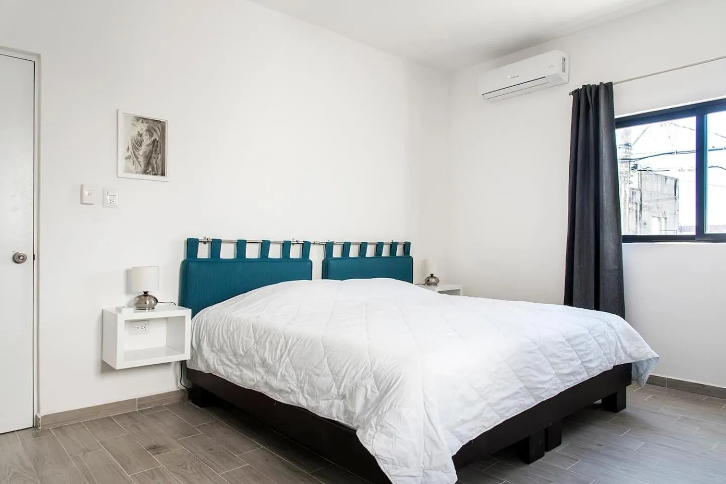 Bed in Valentina Suites by Las Flores Vacation Rentals