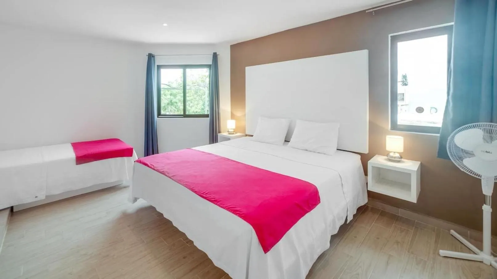 Bed in Valentina Suites by Las Flores Vacation Rentals