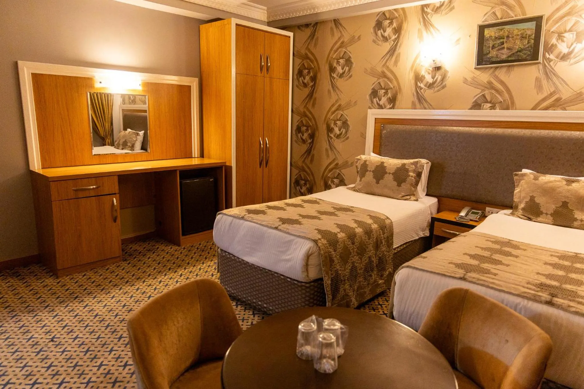 Bed in Grand Rosa Hotel