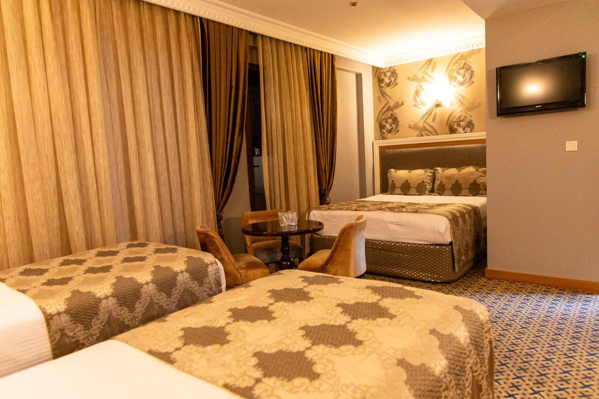 Bed in Grand Rosa Hotel