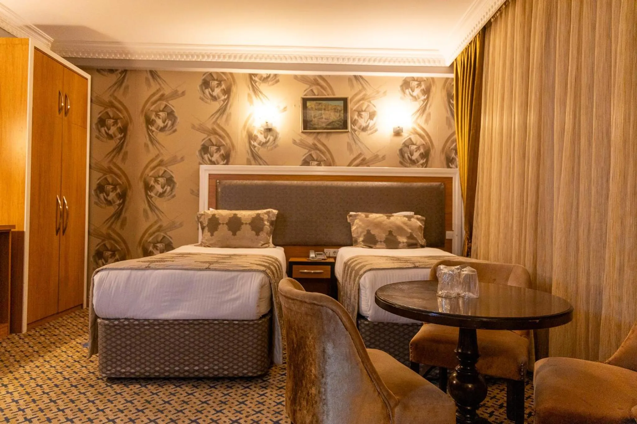 Bed in Grand Rosa Hotel