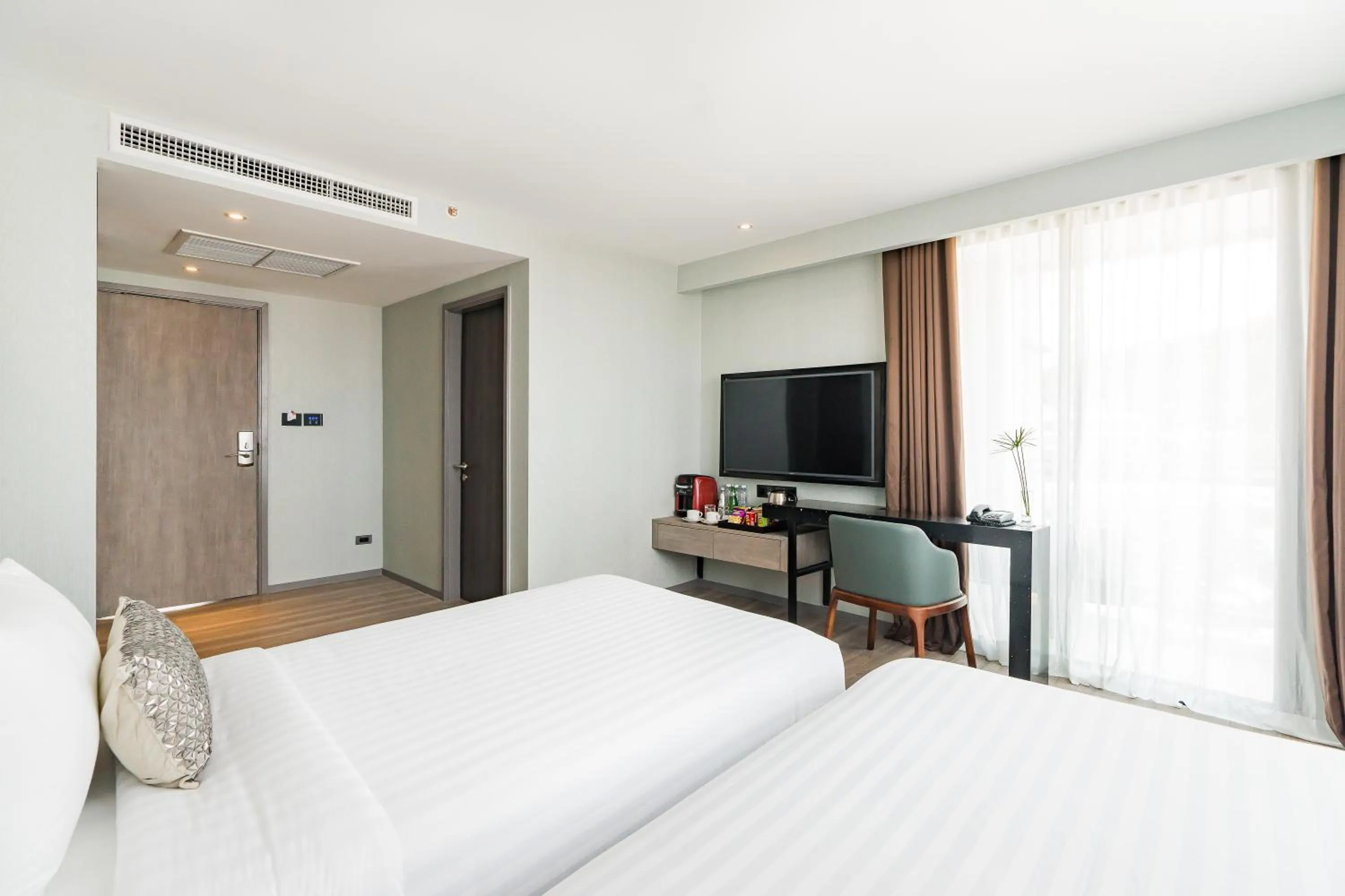 Bed in Citrus Grande Hotel Pattaya by Compass Hospitality