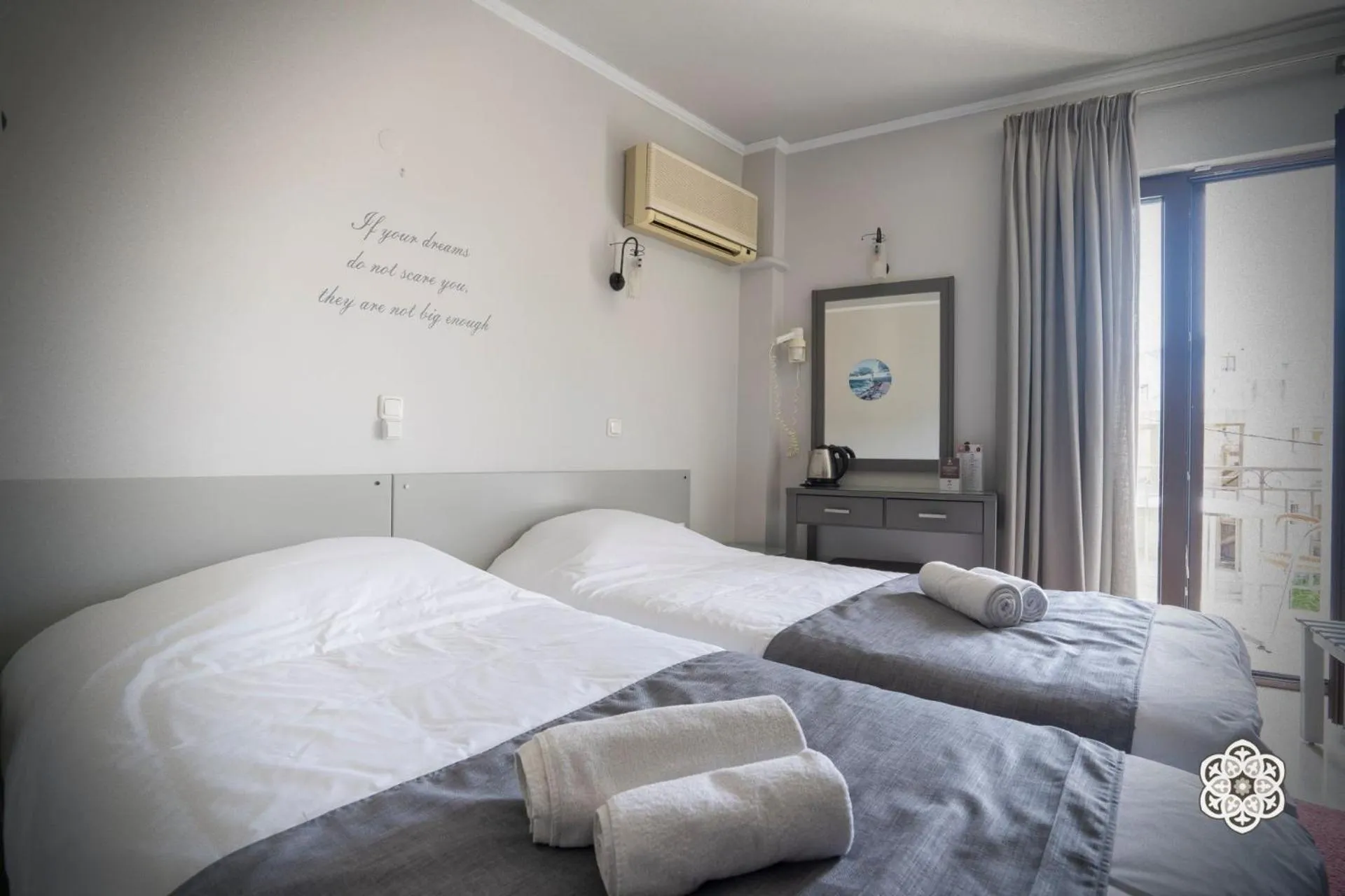 Bed in Aktaion Hotel