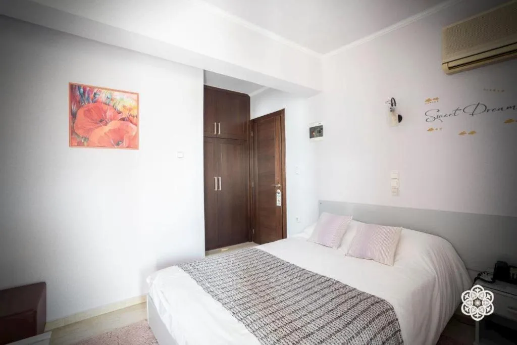 Bed in Aktaion Hotel