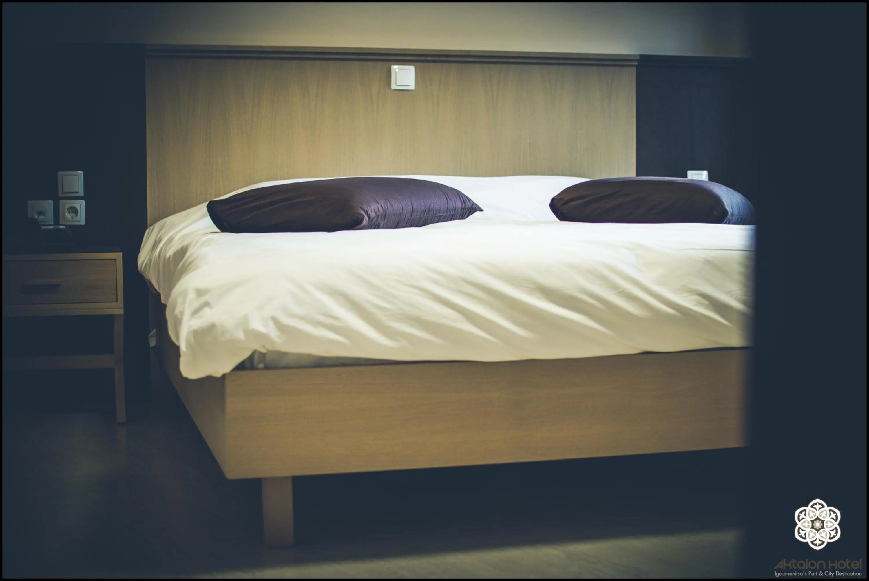 Bed in Aktaion Hotel