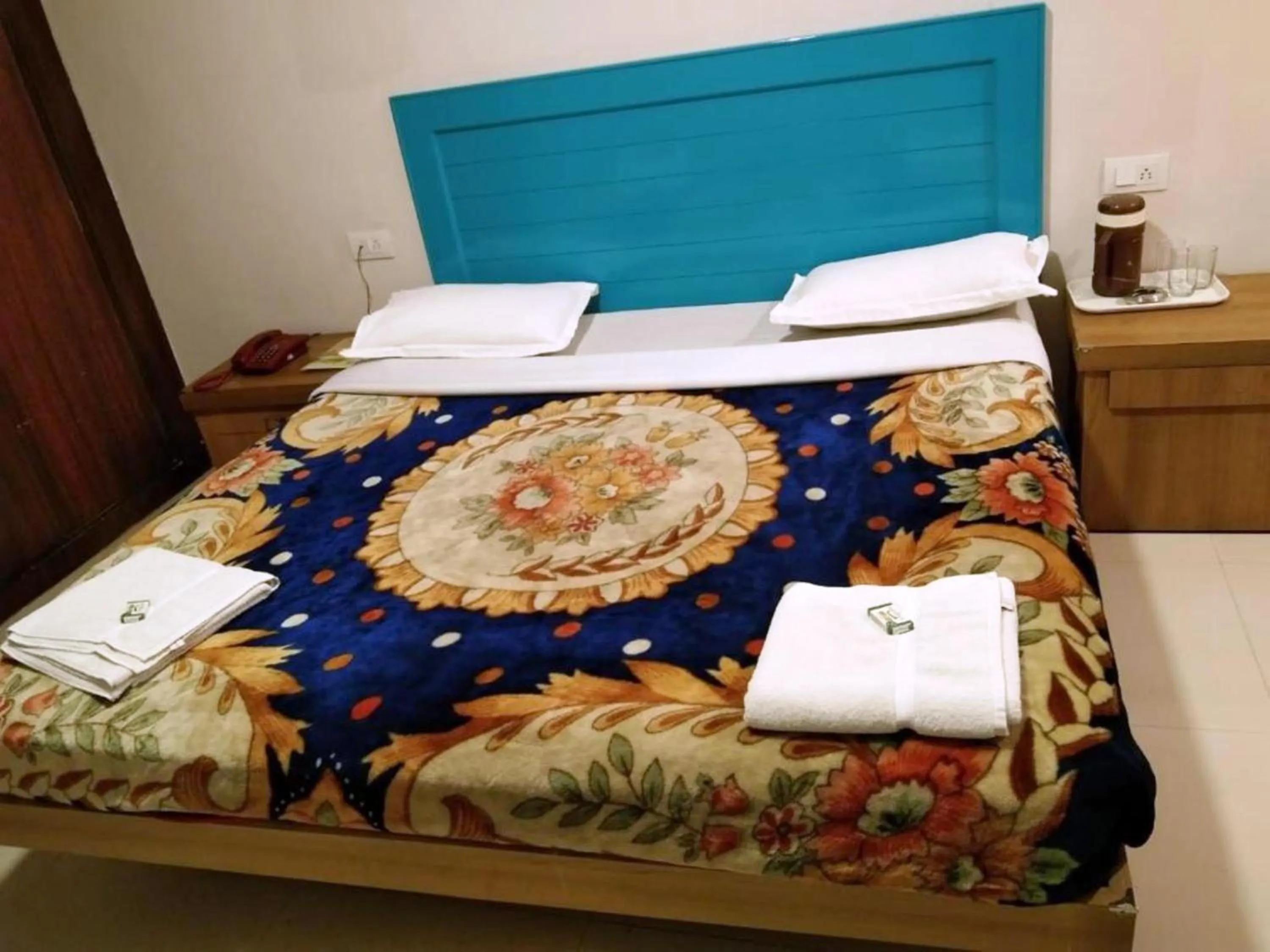 Bed in Hotel Preethi Palace