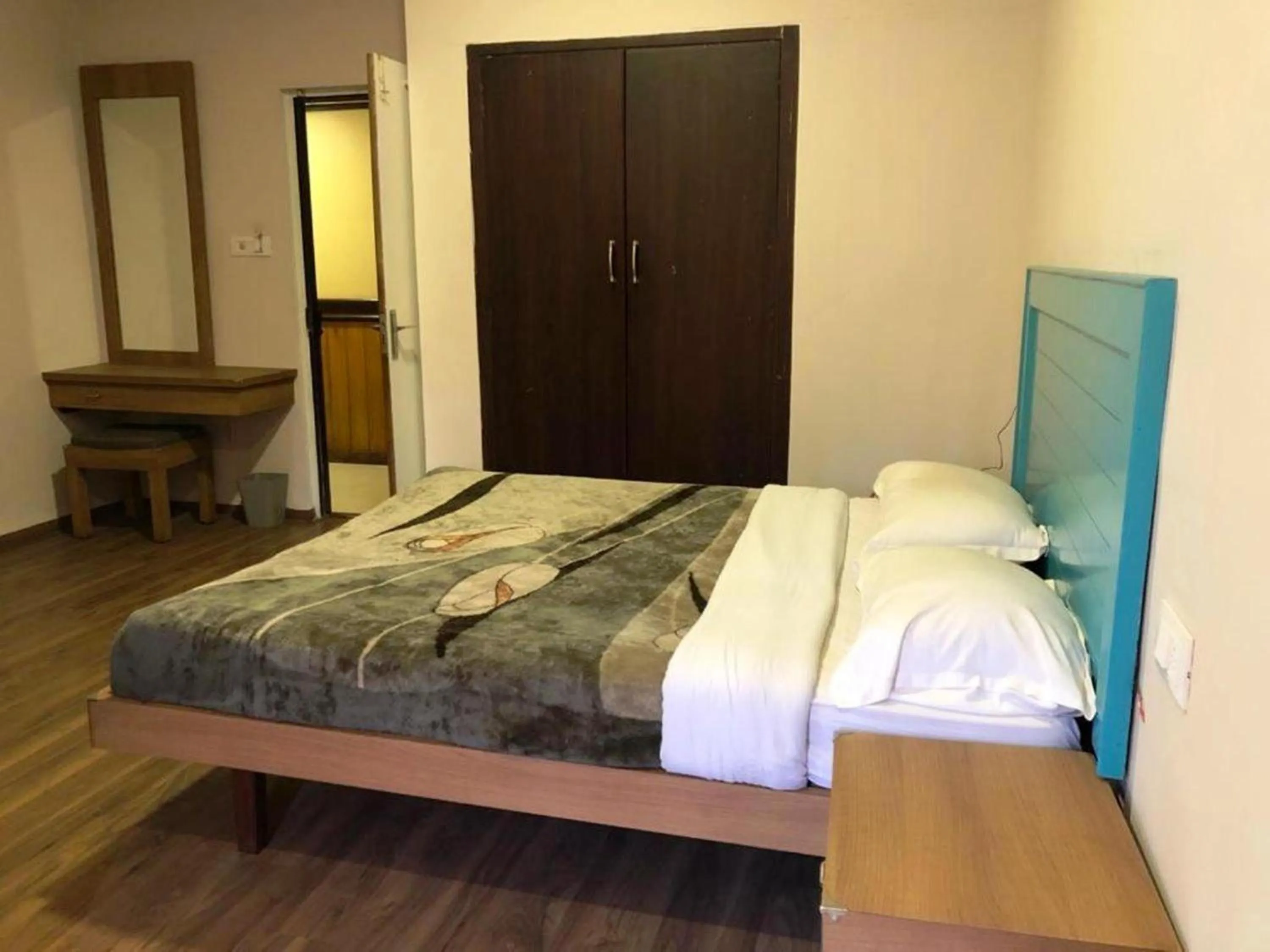 Bed in Hotel Preethi Palace