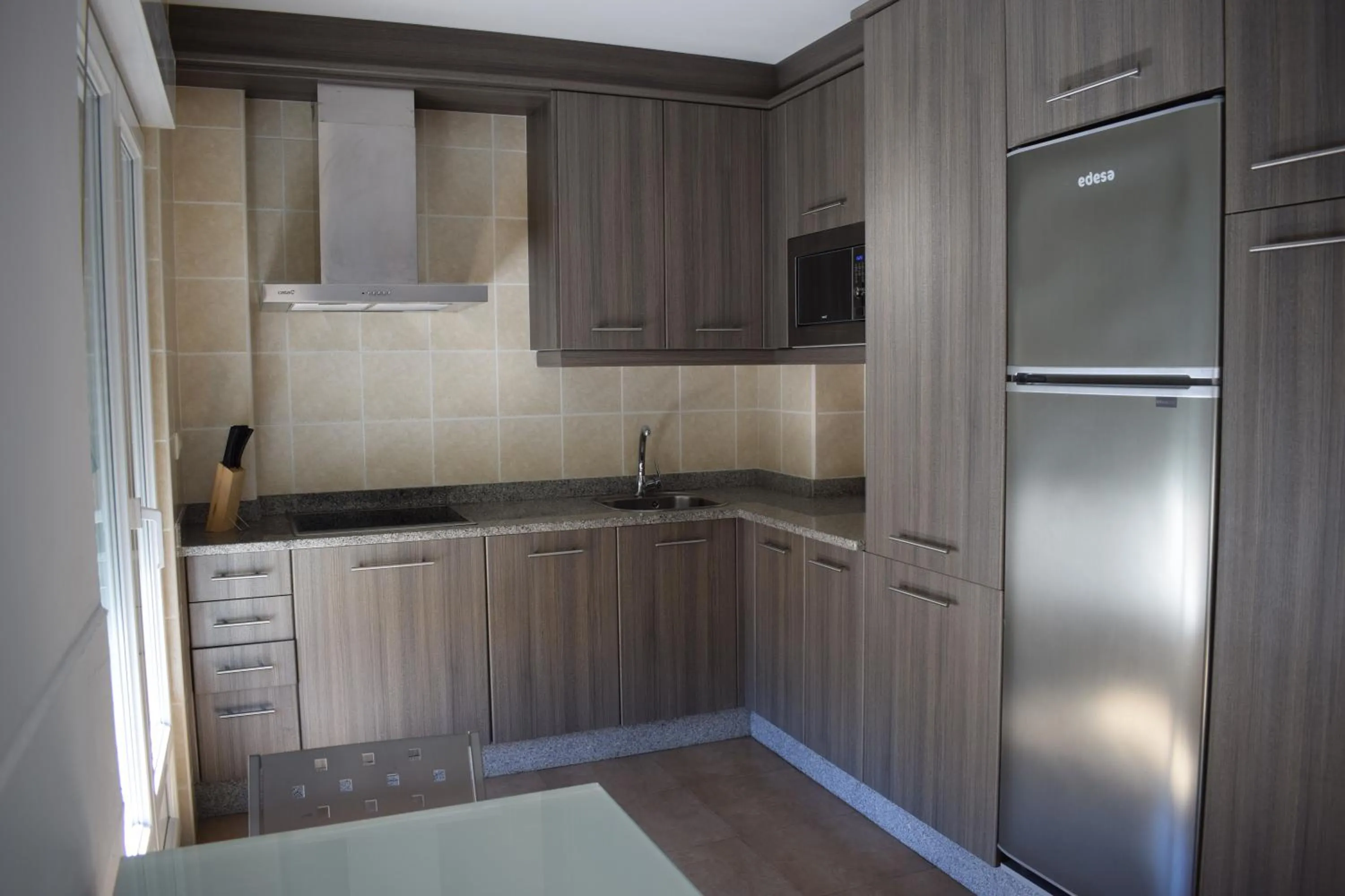 Kitchen or kitchenette in Apartamentos VIDA Finisterre