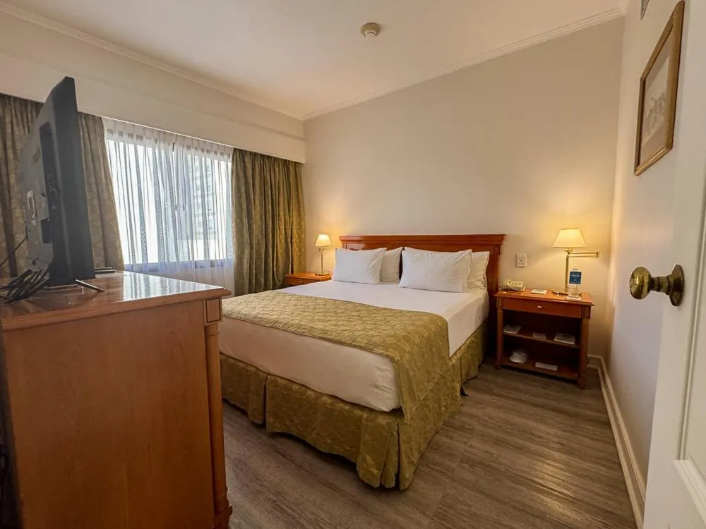 Bed in Austral Plaza Hotel