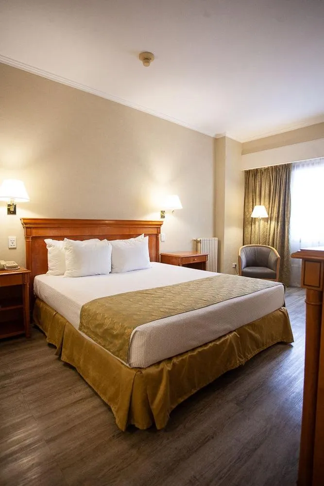 Bed in Austral Plaza Hotel