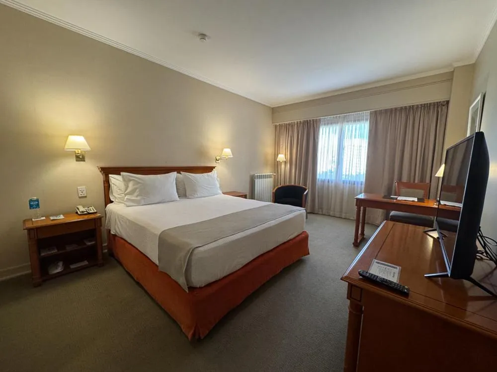 Bed in Austral Plaza Hotel