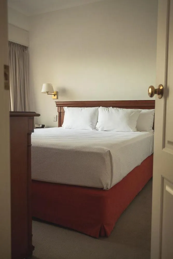 Bed in Austral Plaza Hotel