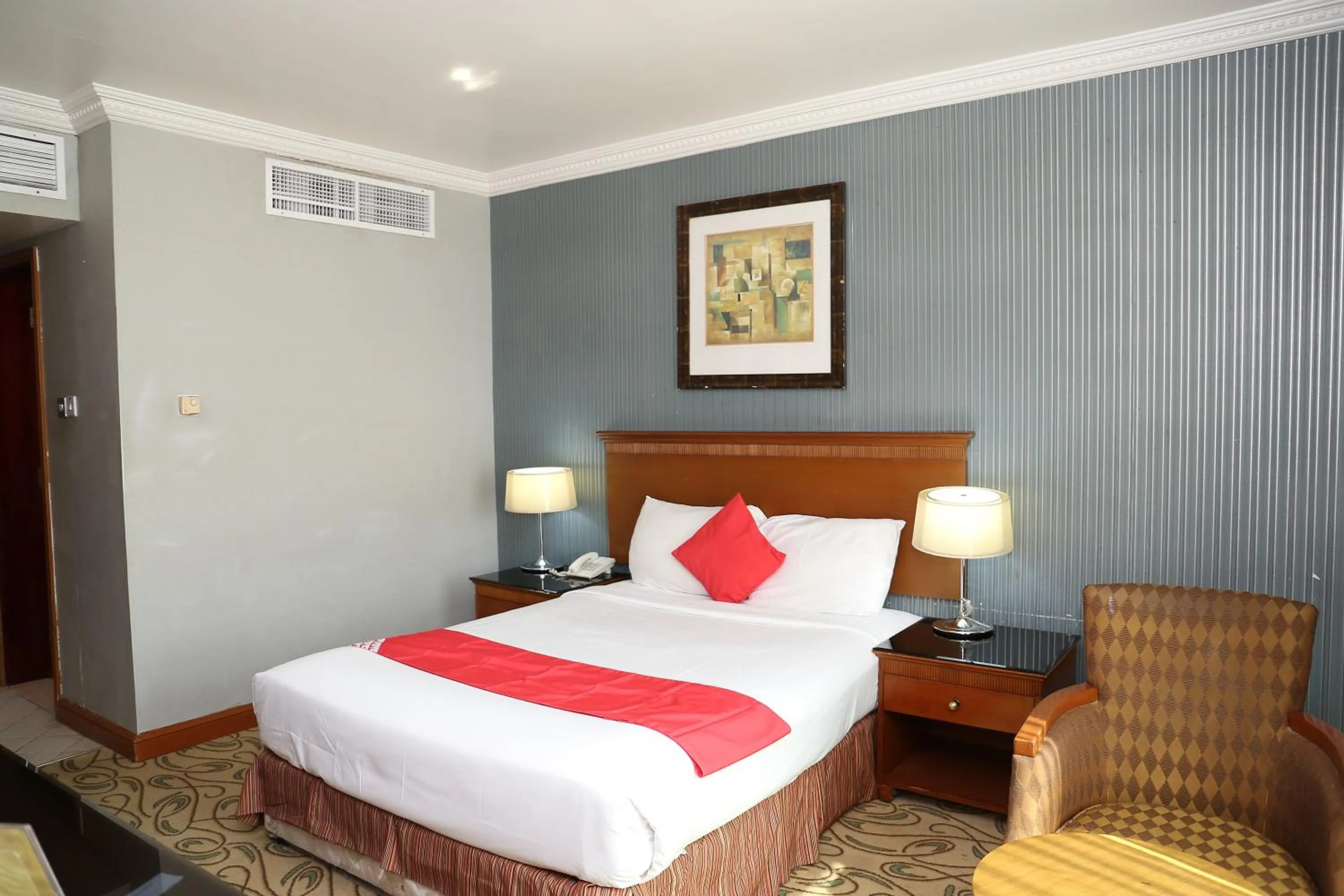 Bed in City Plaza Hotel