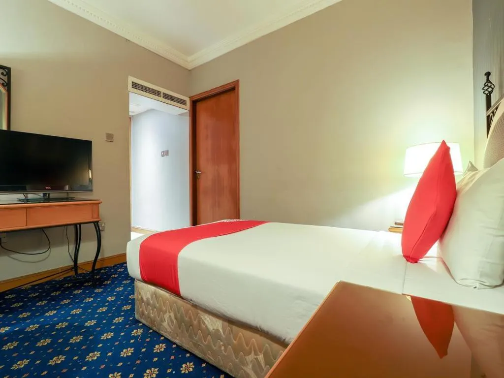 Bed in City Plaza Hotel