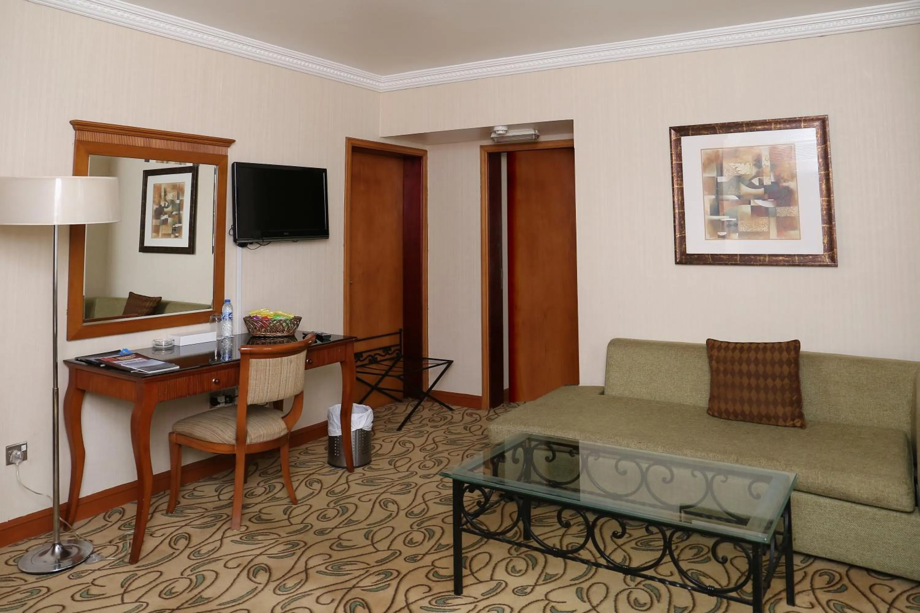 Living room in City Plaza Hotel