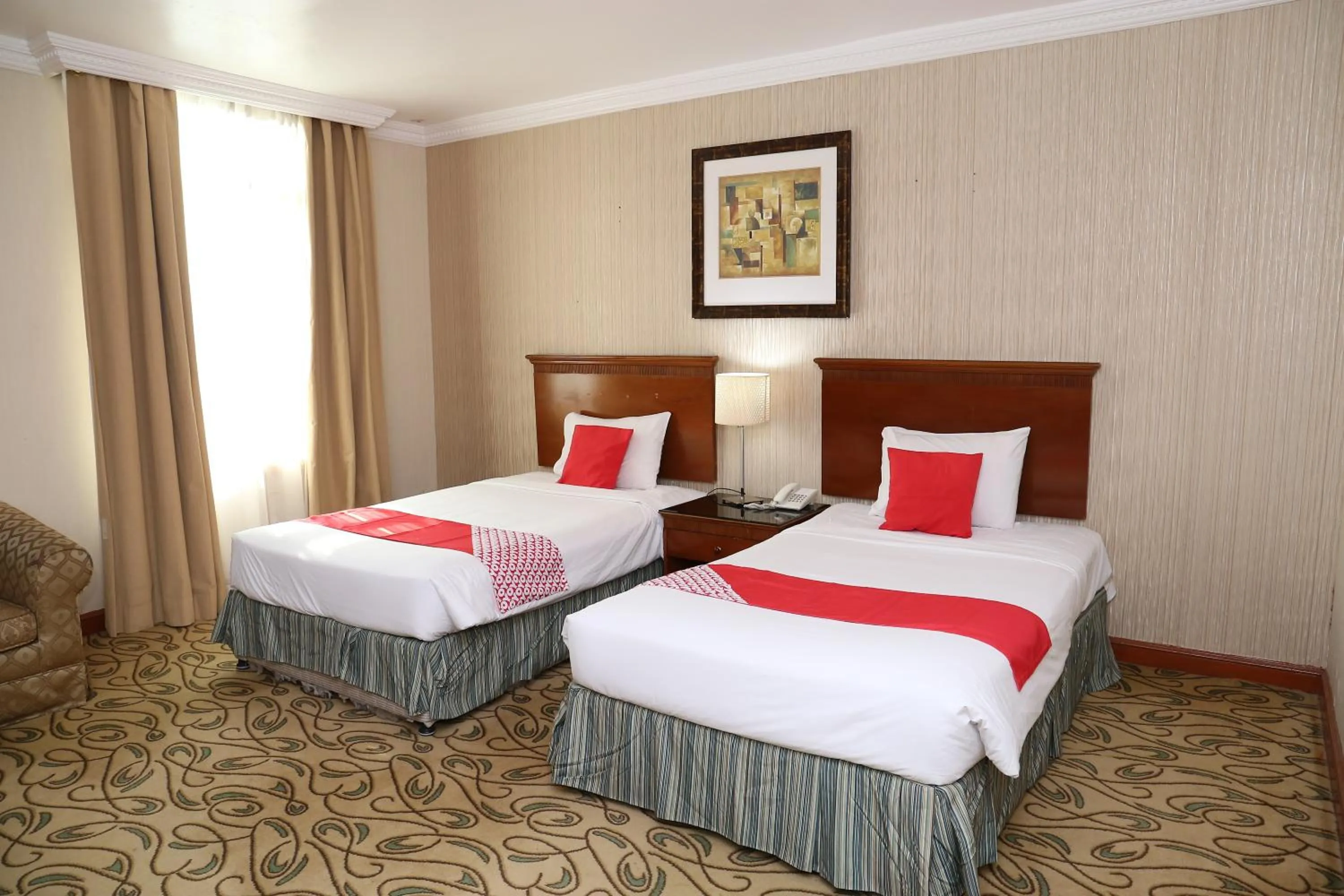 Bed in City Plaza Hotel