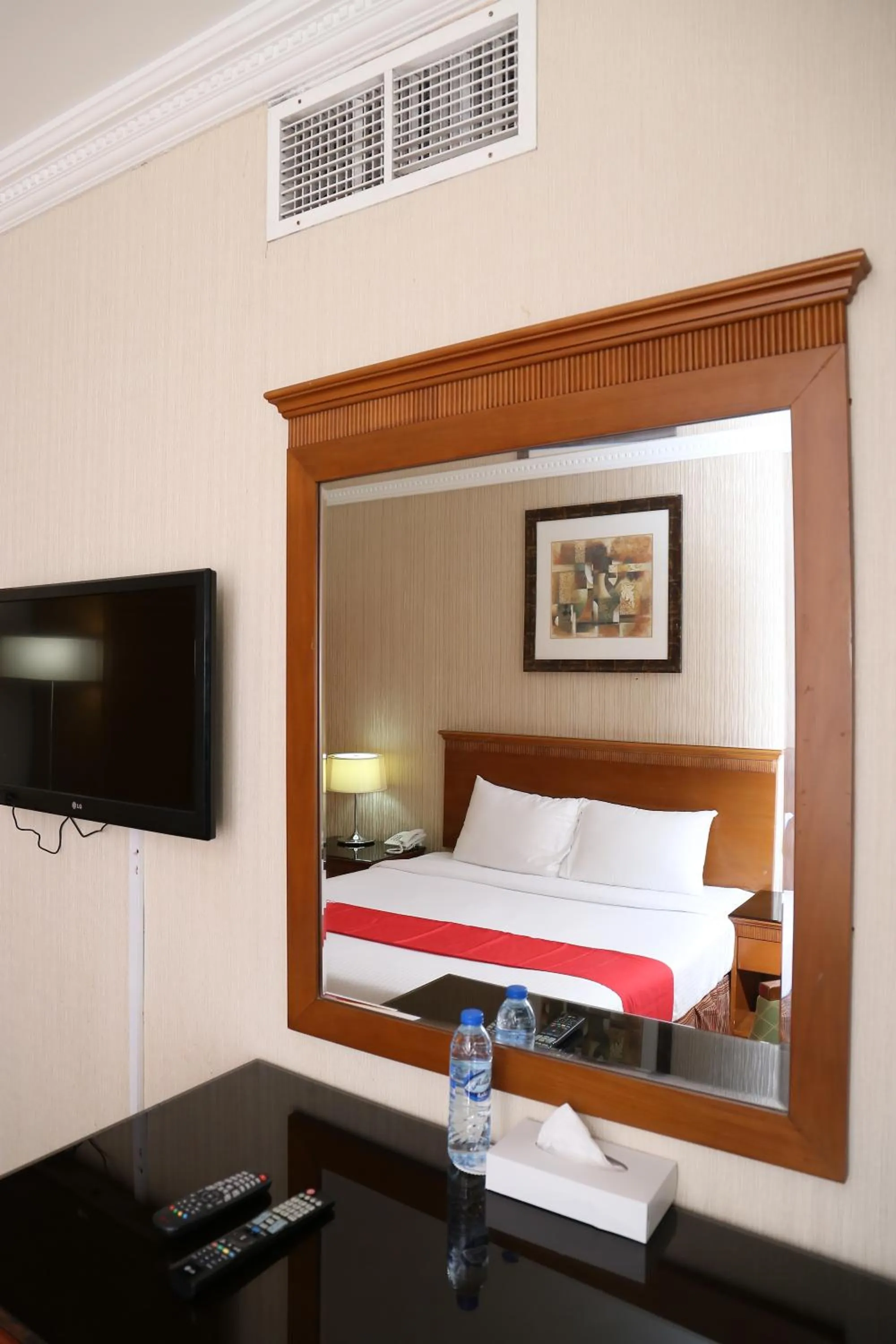 Bed in City Plaza Hotel