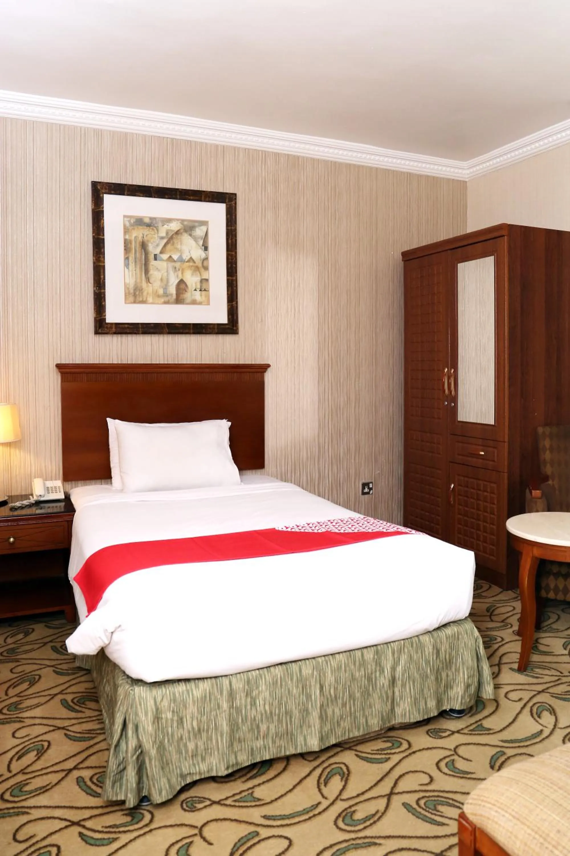 Bed in City Plaza Hotel