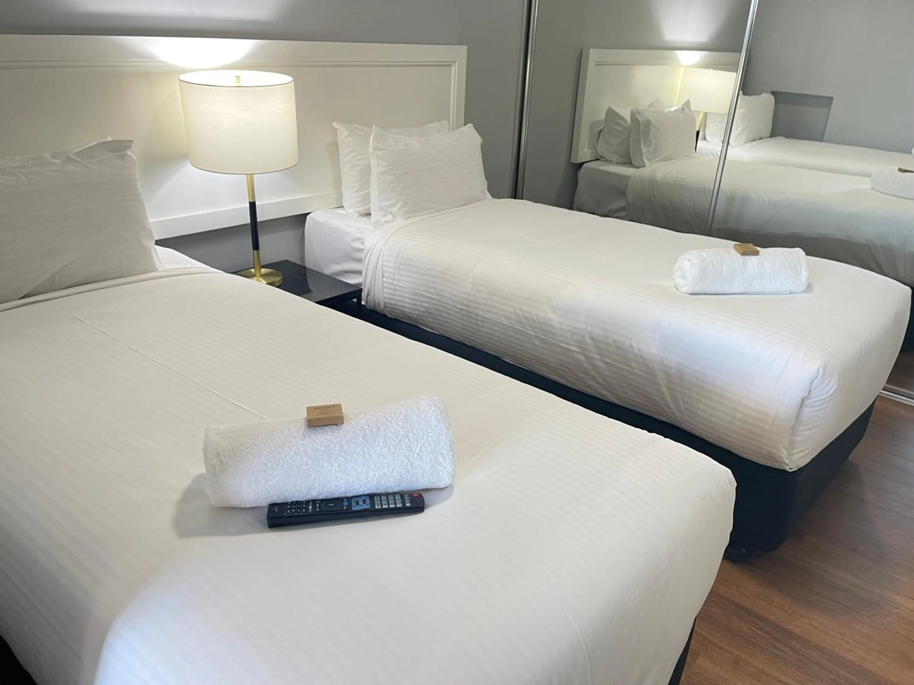 Bed in Honeysuckle Executive Apartments