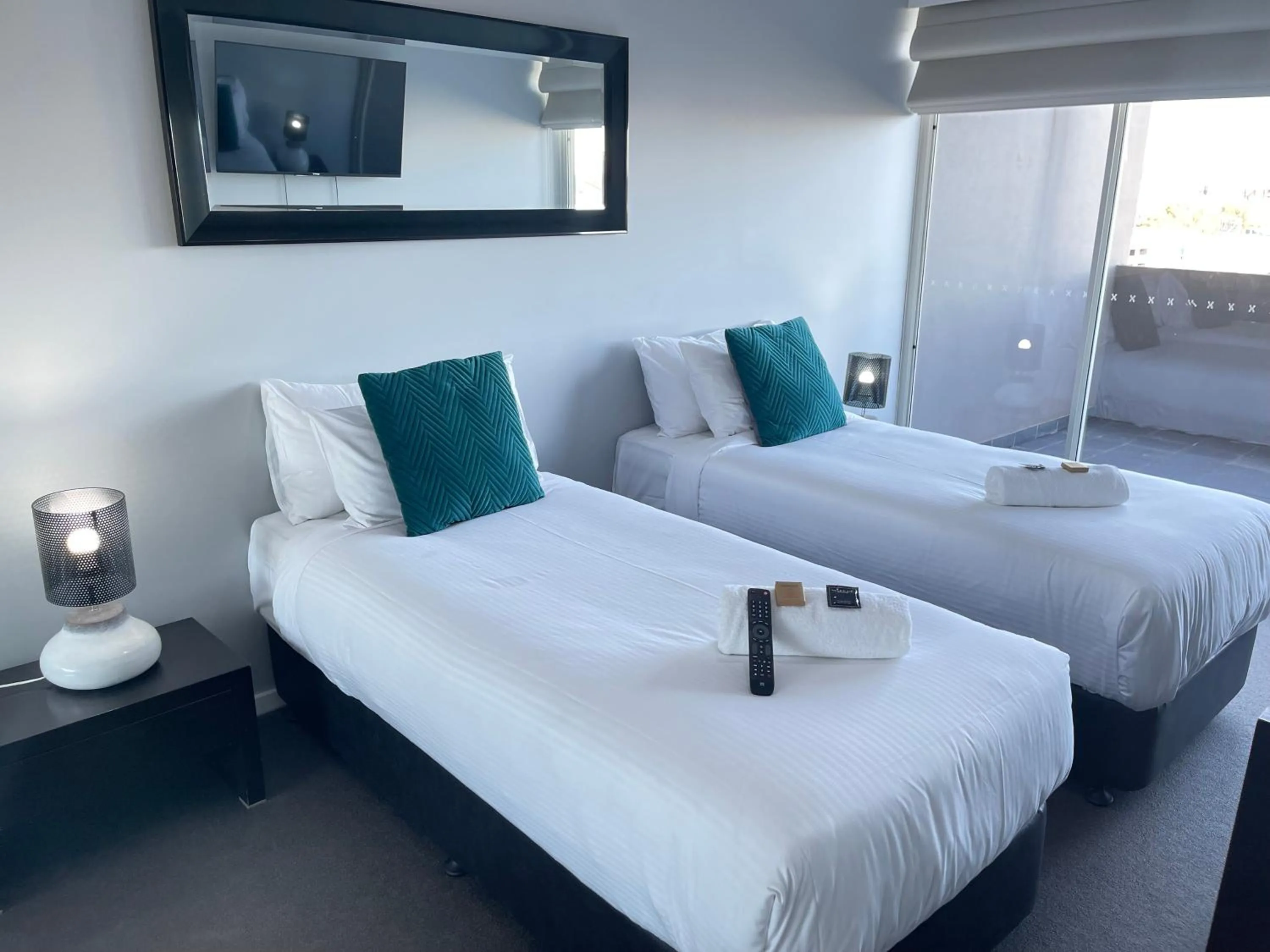 Bed in Honeysuckle Executive Apartments