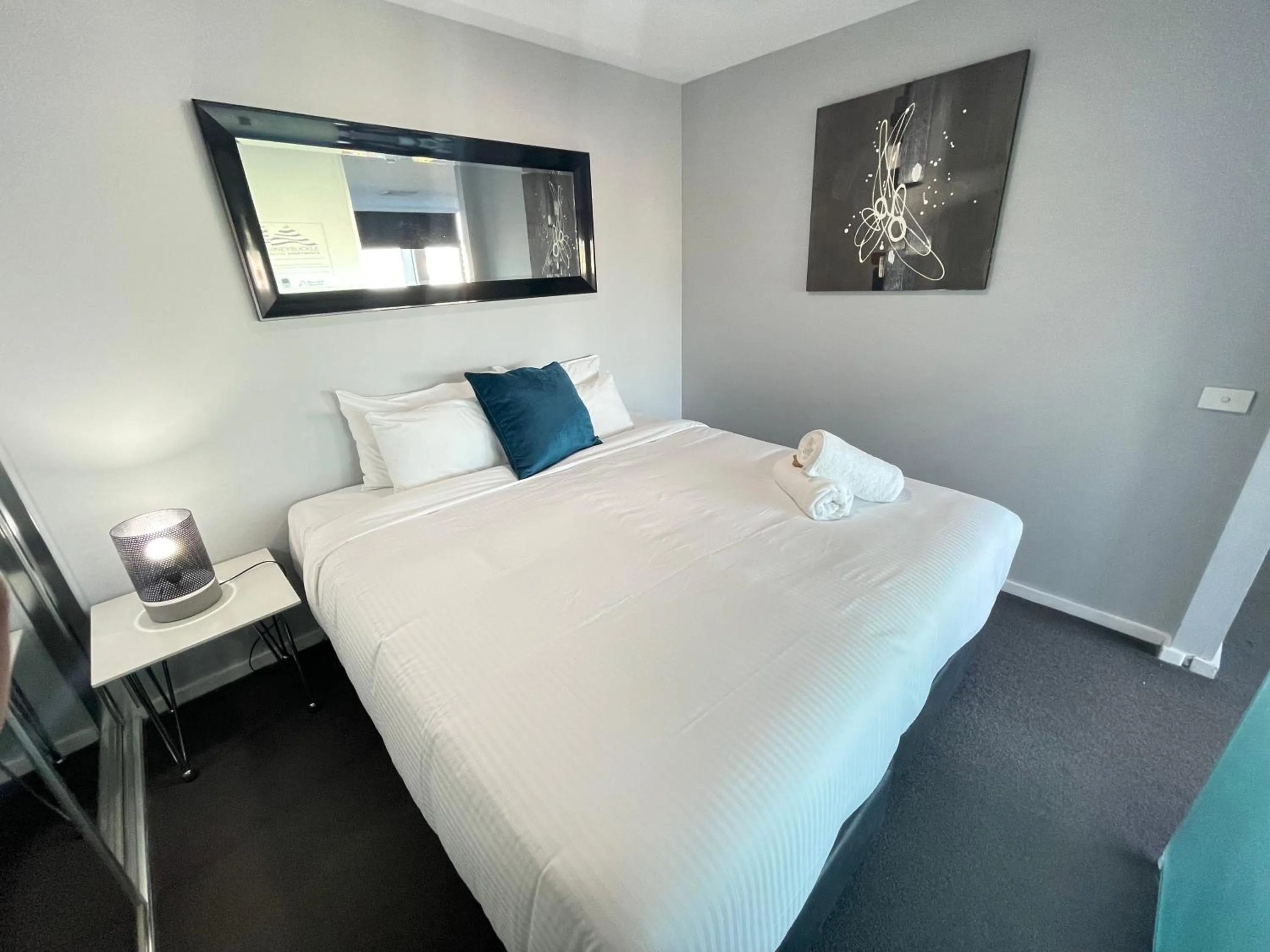 Bed in Honeysuckle Executive Apartments