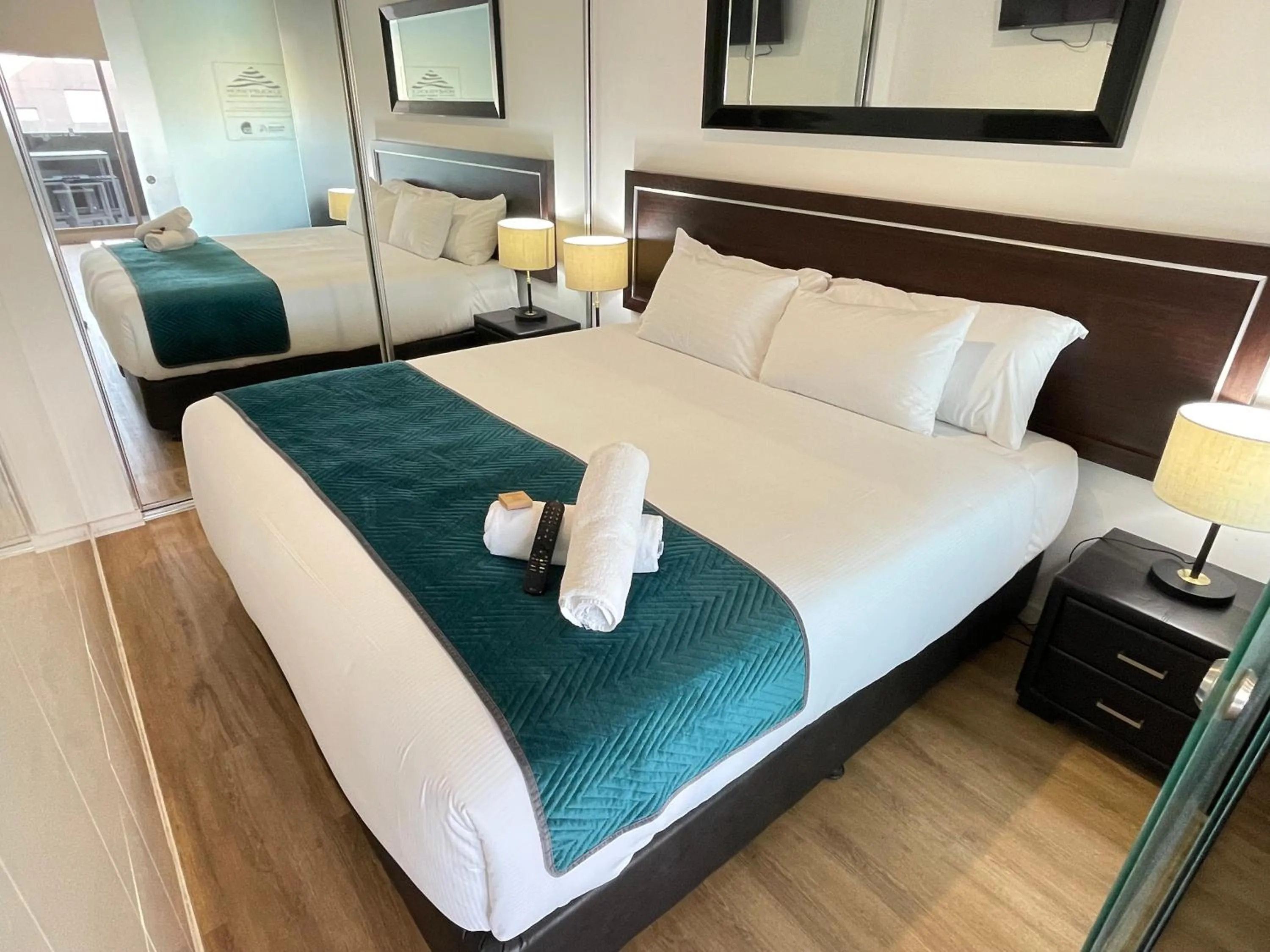 Bed in Honeysuckle Executive Apartments