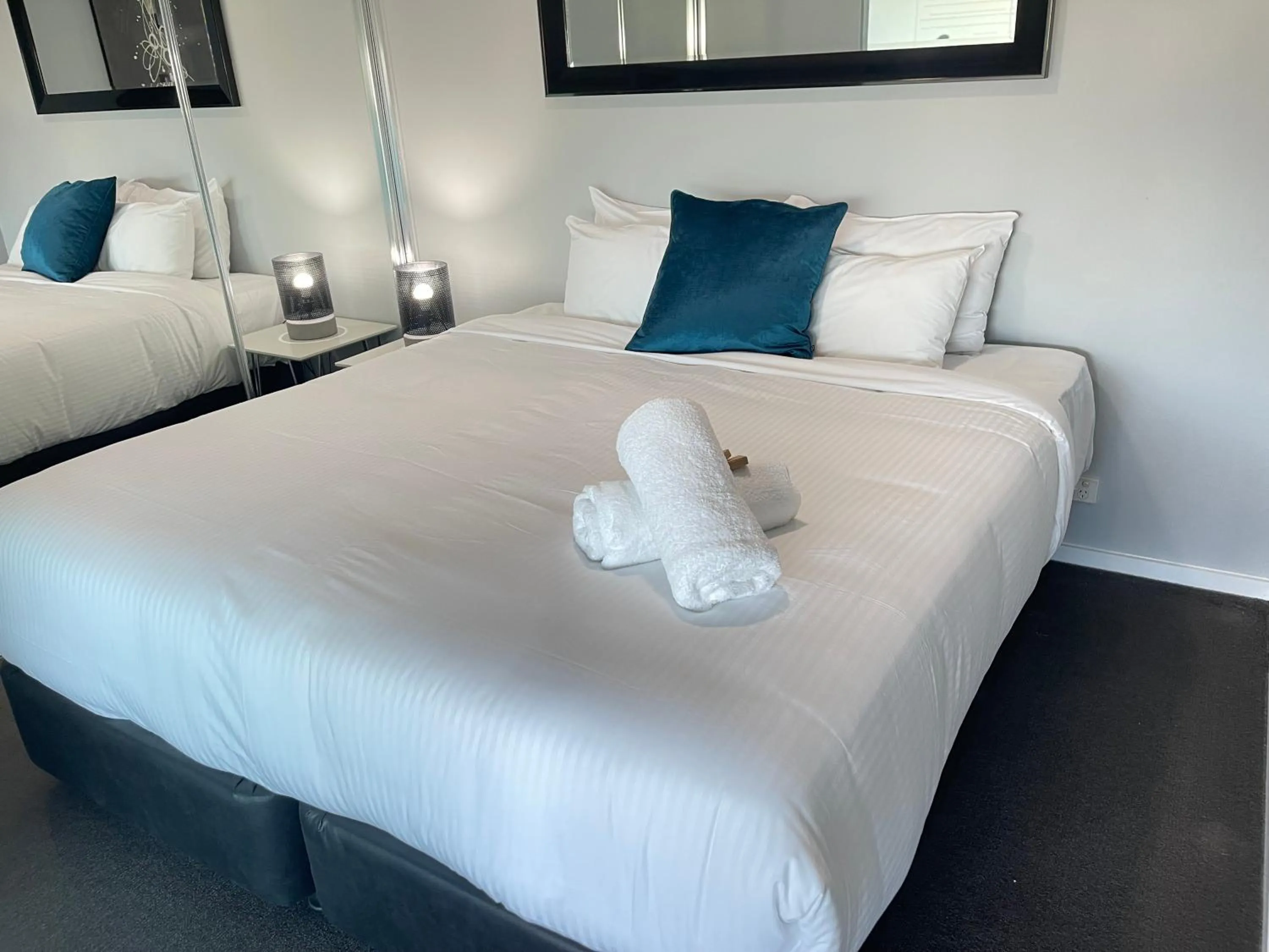 Bed in Honeysuckle Executive Apartments