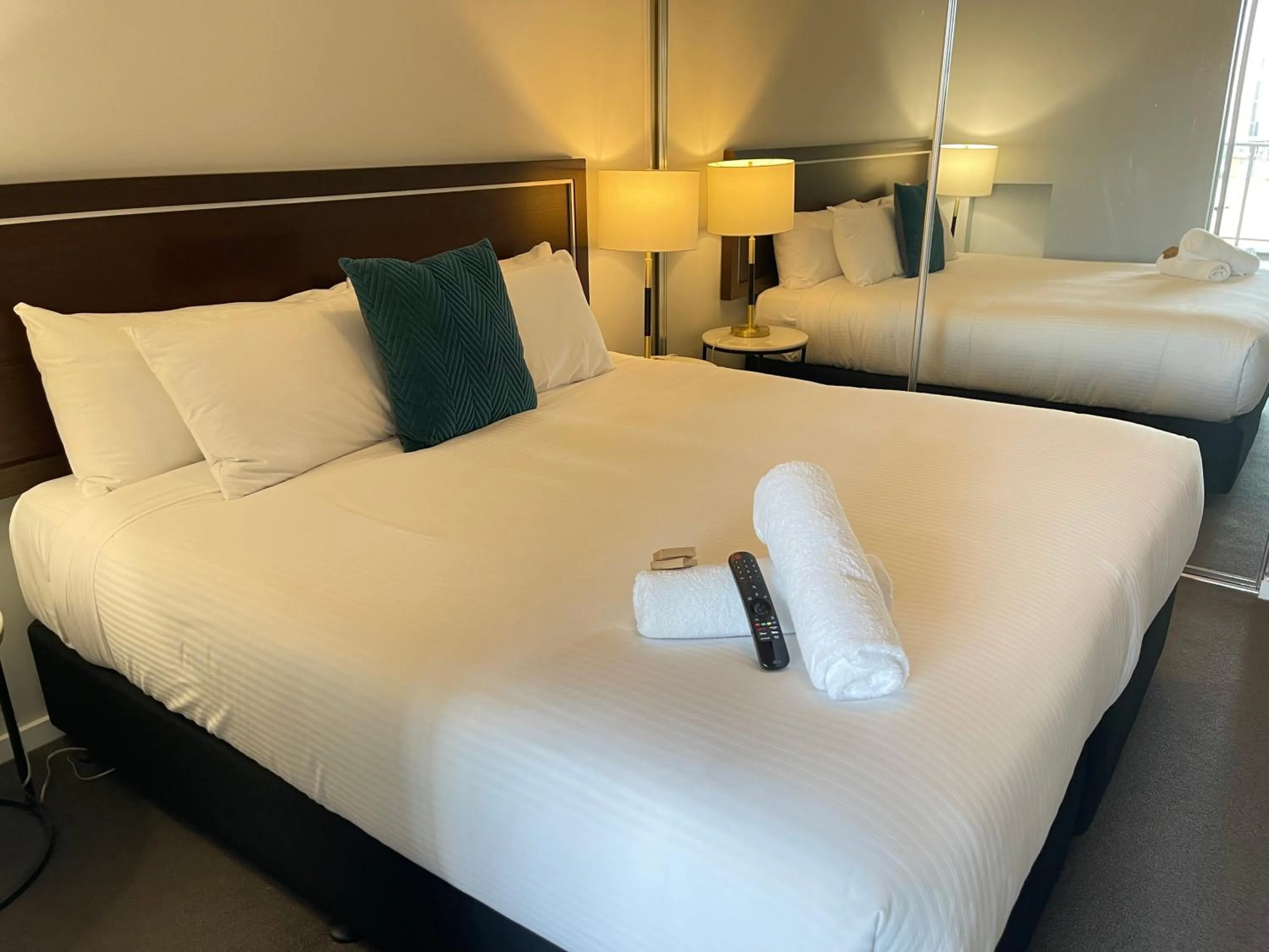 Bed in Honeysuckle Executive Apartments