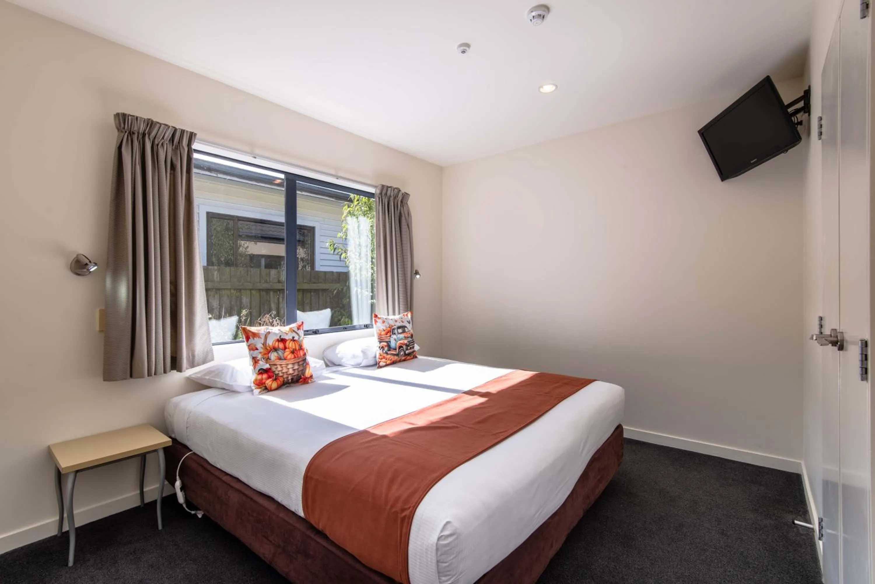 Bed in 298 Westside Motor Lodge