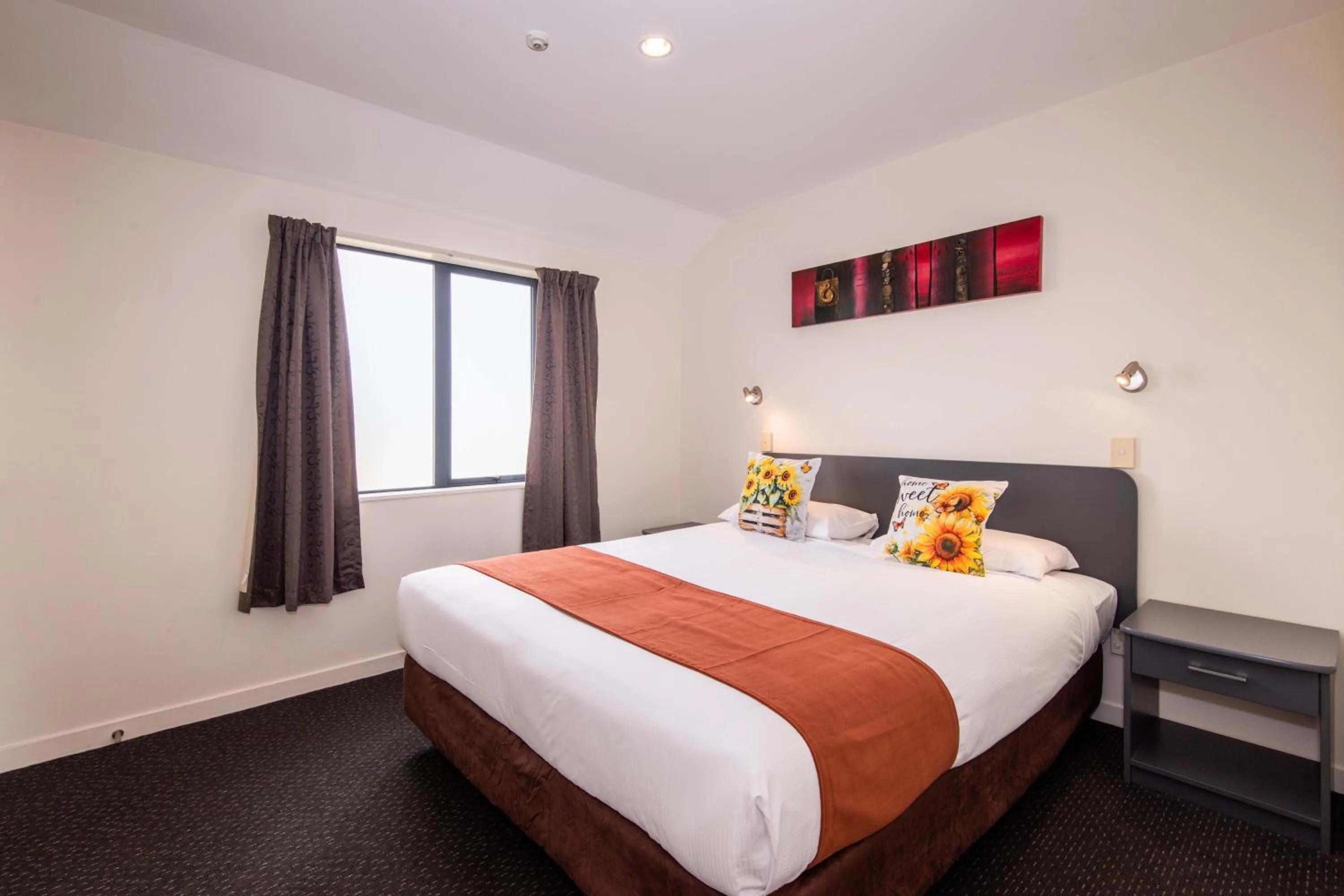 Bed in 298 Westside Motor Lodge