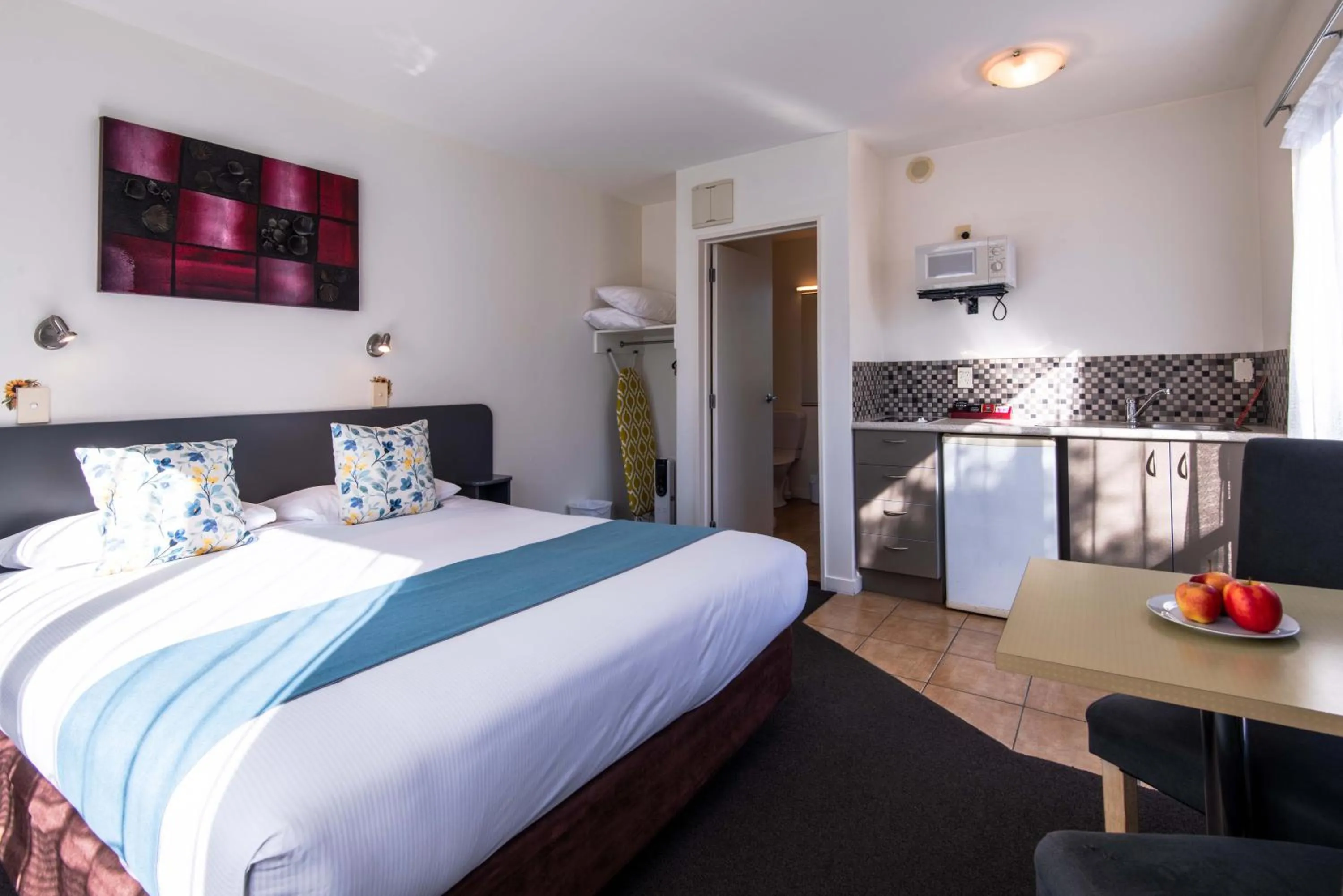 Bed in 298 Westside Motor Lodge