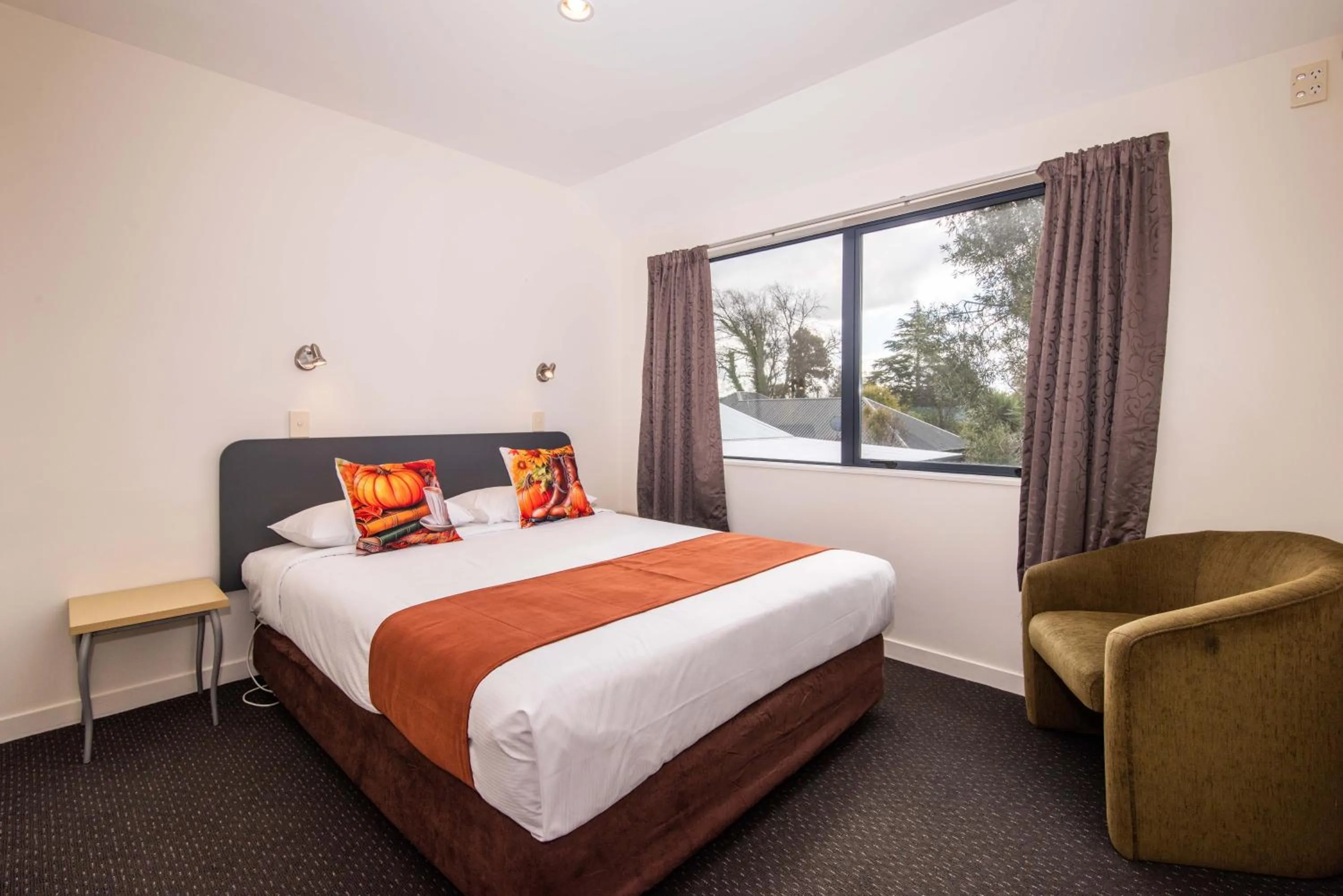 Bed in 298 Westside Motor Lodge