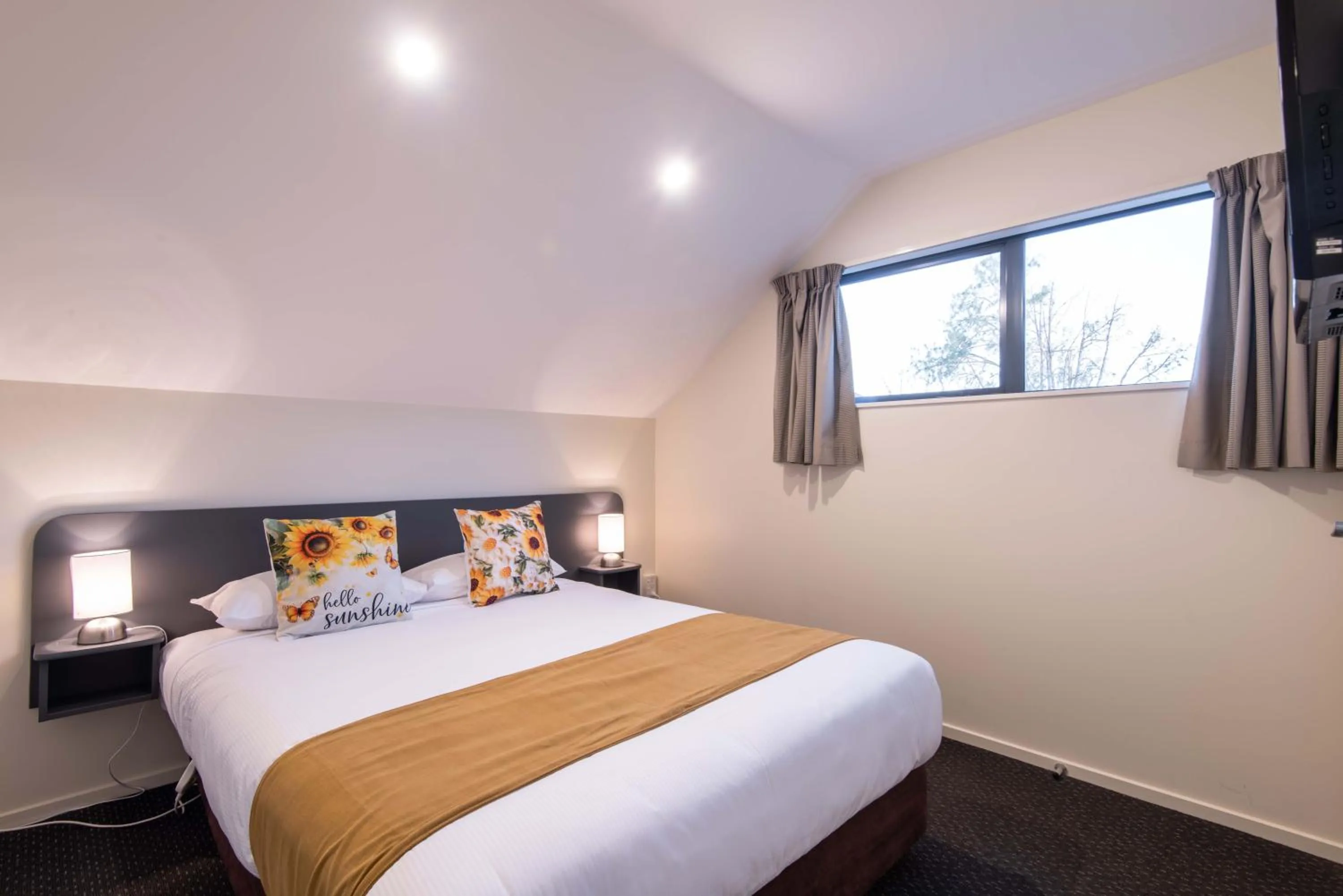 Bed in 298 Westside Motor Lodge