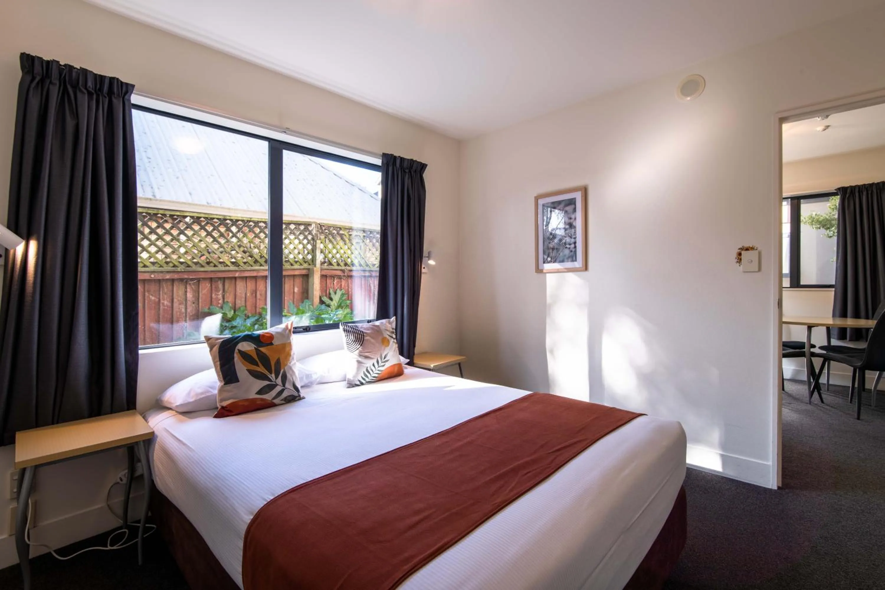 Bed in 298 Westside Motor Lodge