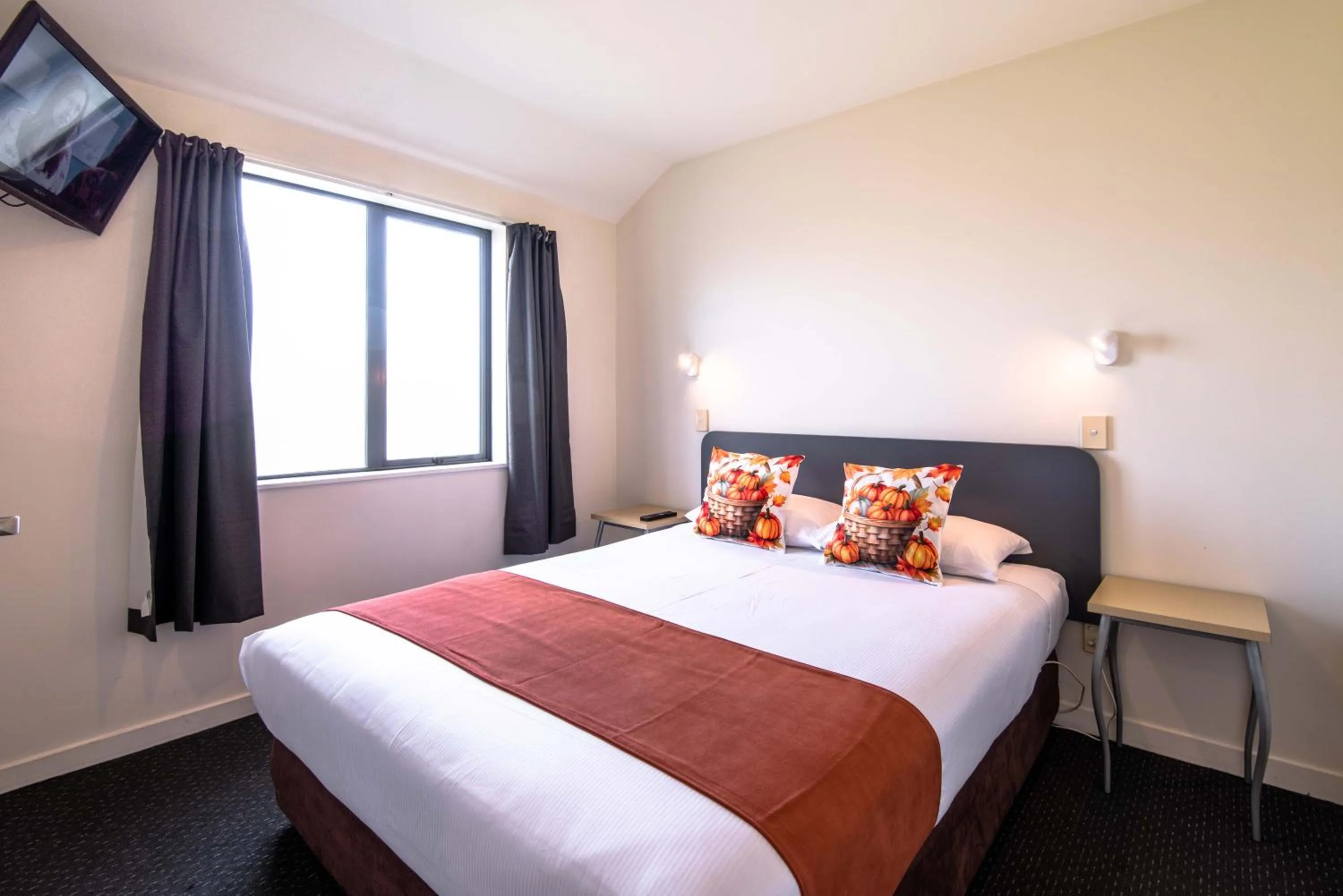 Bed in 298 Westside Motor Lodge