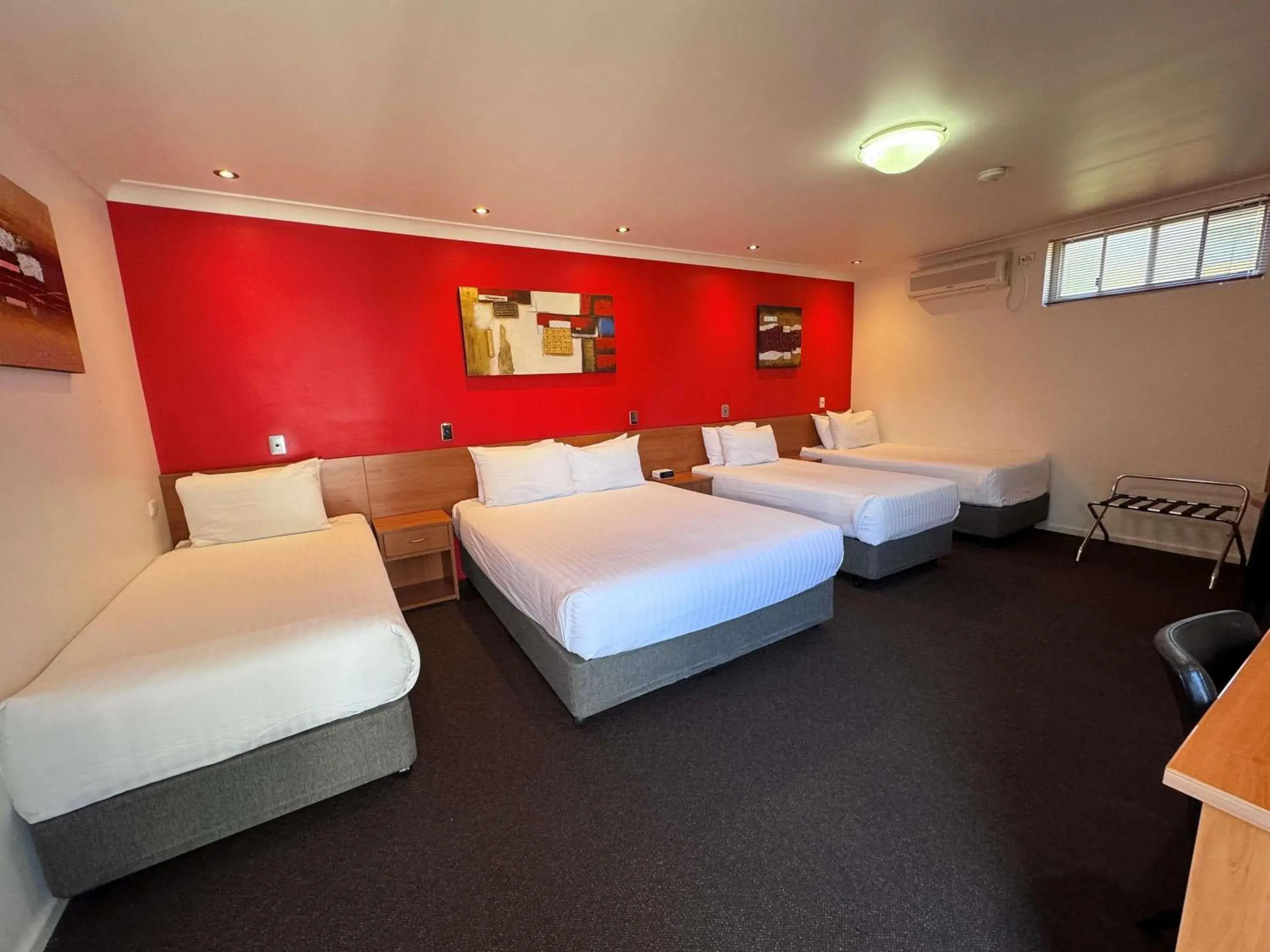 Family Room with a Queen Bed and Two Single Beds in ibis Styles Broken Hill Family Room with a Queen Bed and Two Single Beds in ibis Styles Broken Hill