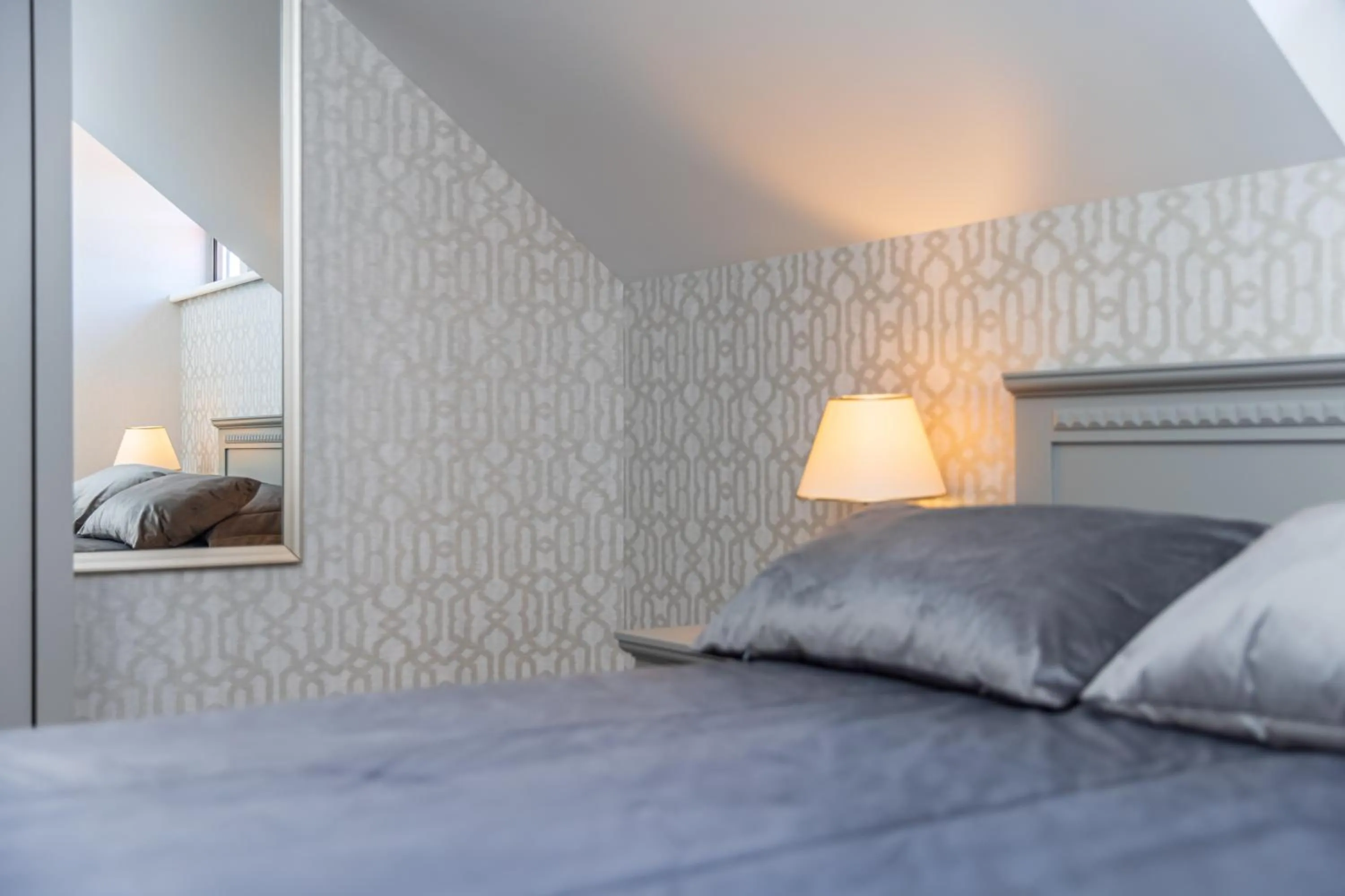 Bed in Senoji Hansa Hotel