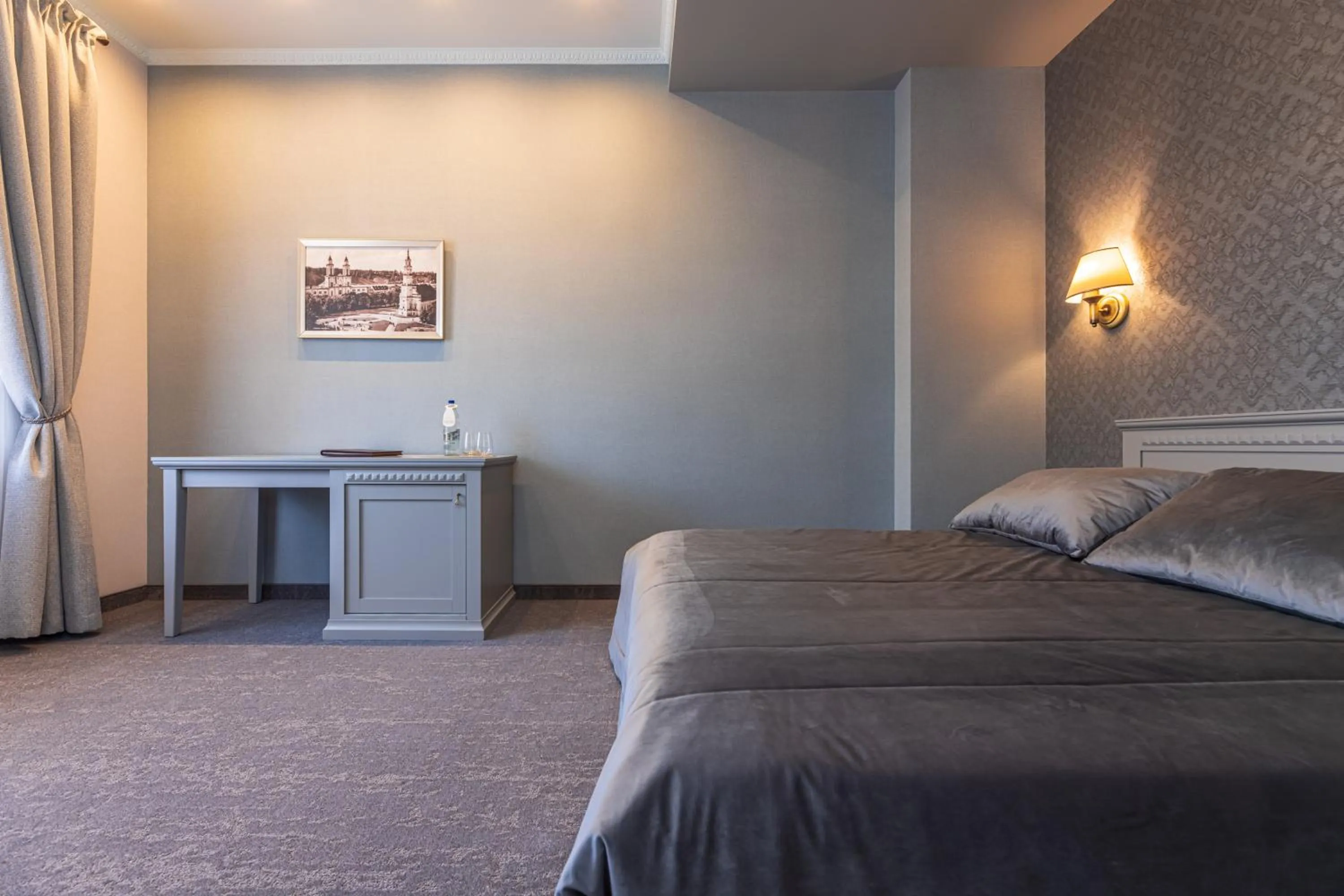 Bed in Senoji Hansa Hotel