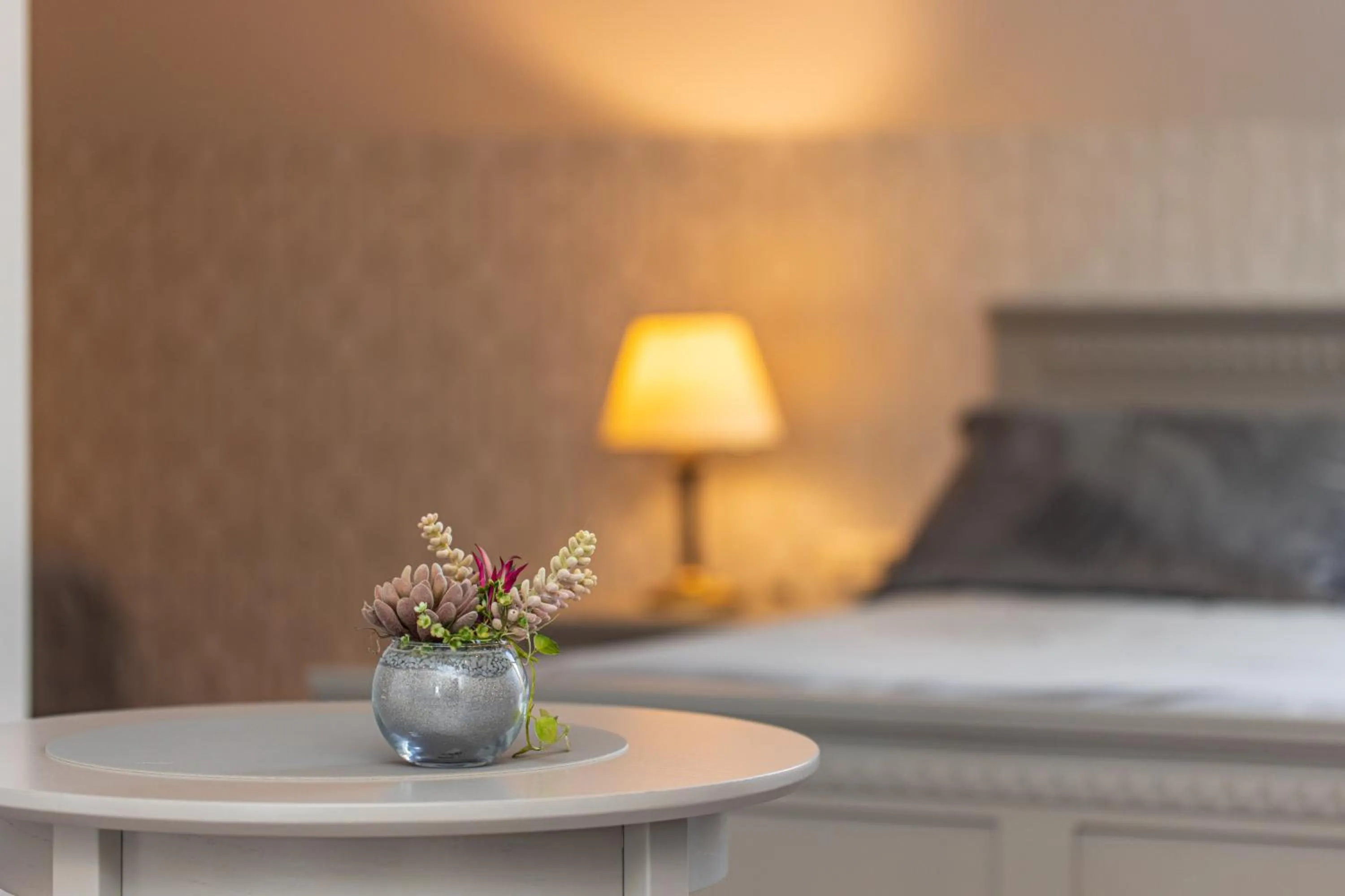 Seating area, Bed in Senoji Hansa Hotel