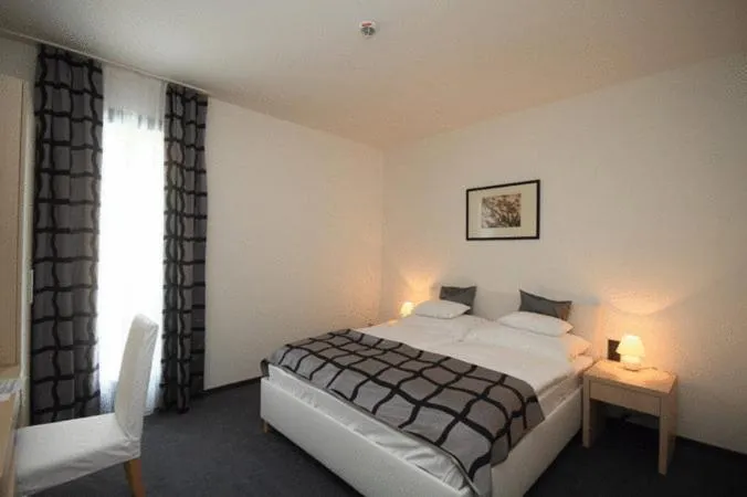 Bed in Hotel Arkadia