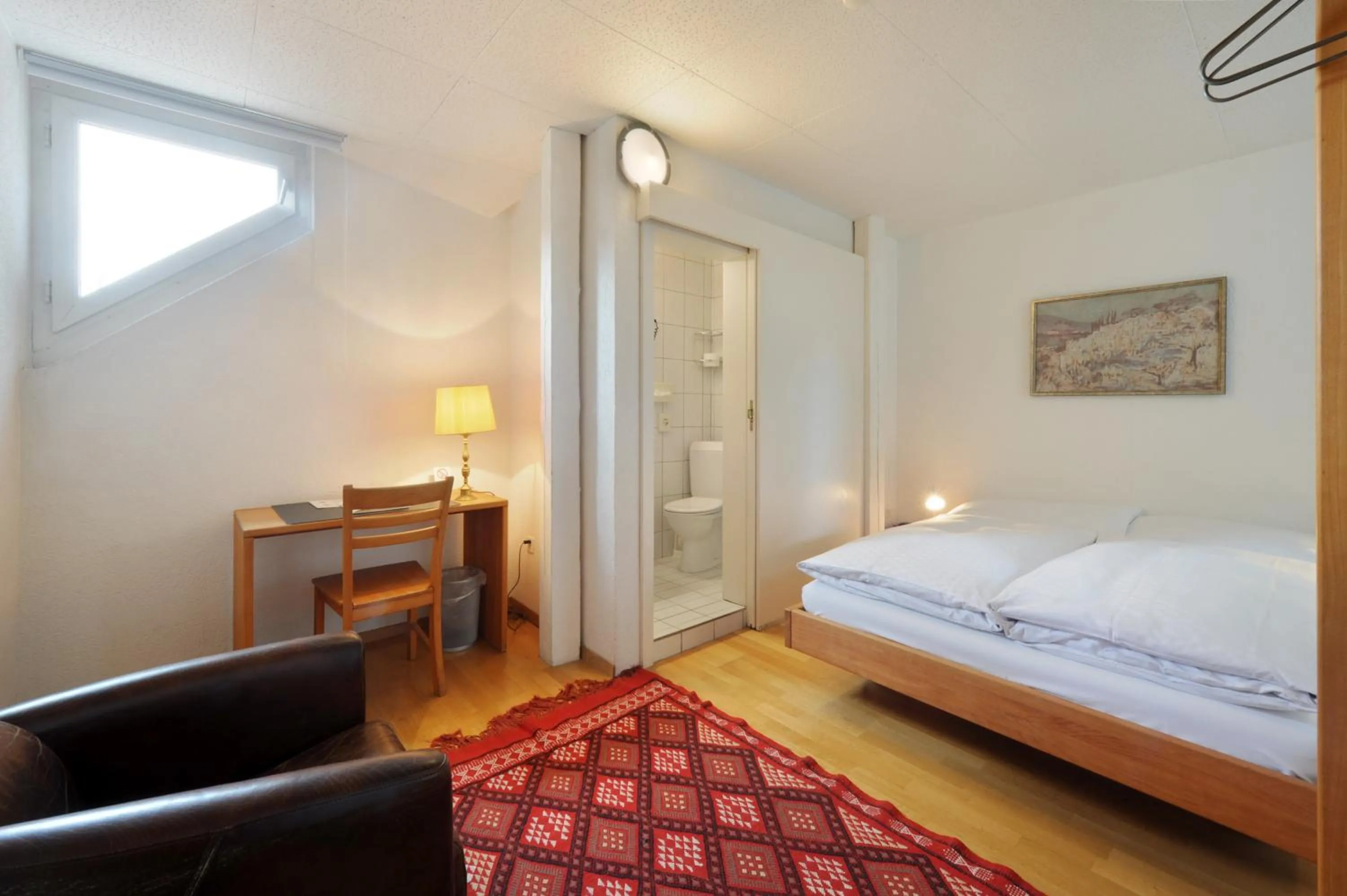 Photo of the whole room, Bed in Hotel National Bern