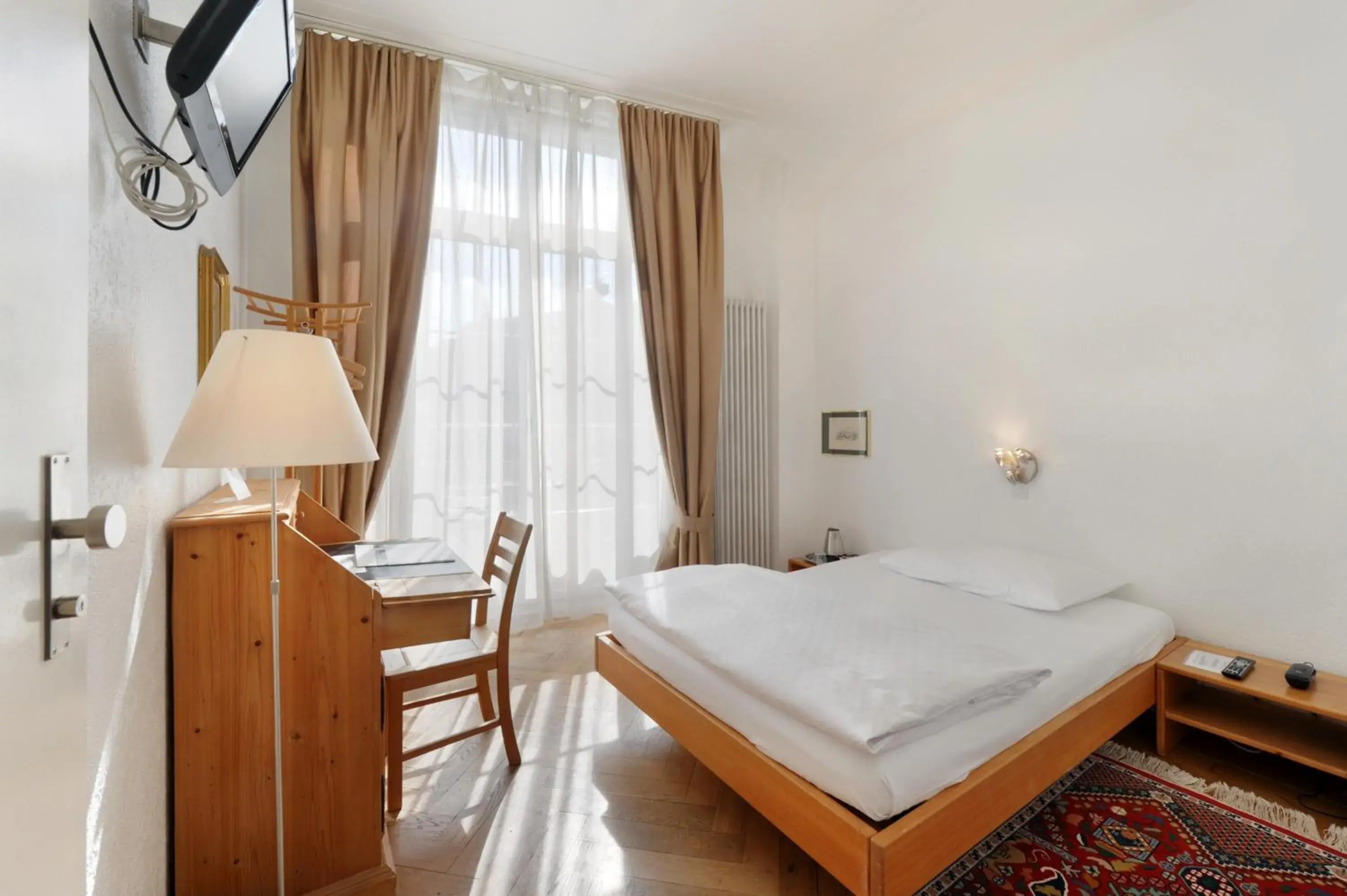 Single Room in Hotel National Bern Single Room in Hotel National Bern