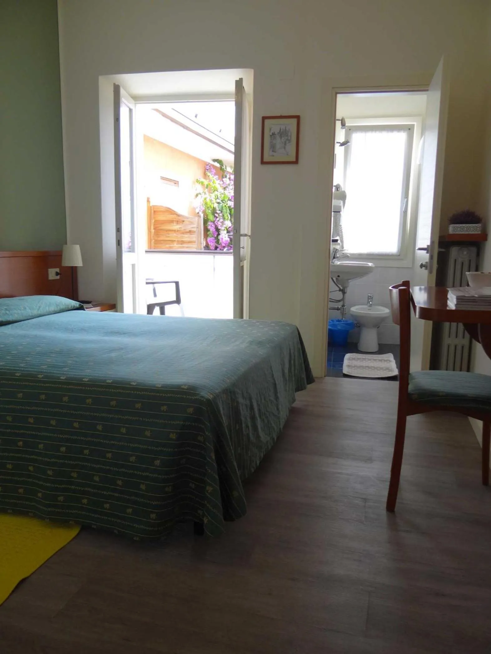 Bed in Belvedere Hotel & Villa