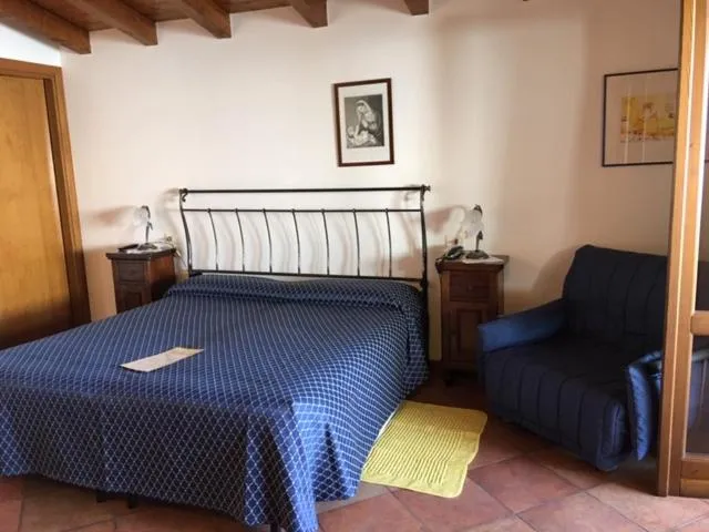 Bed in Belvedere Hotel & Villa