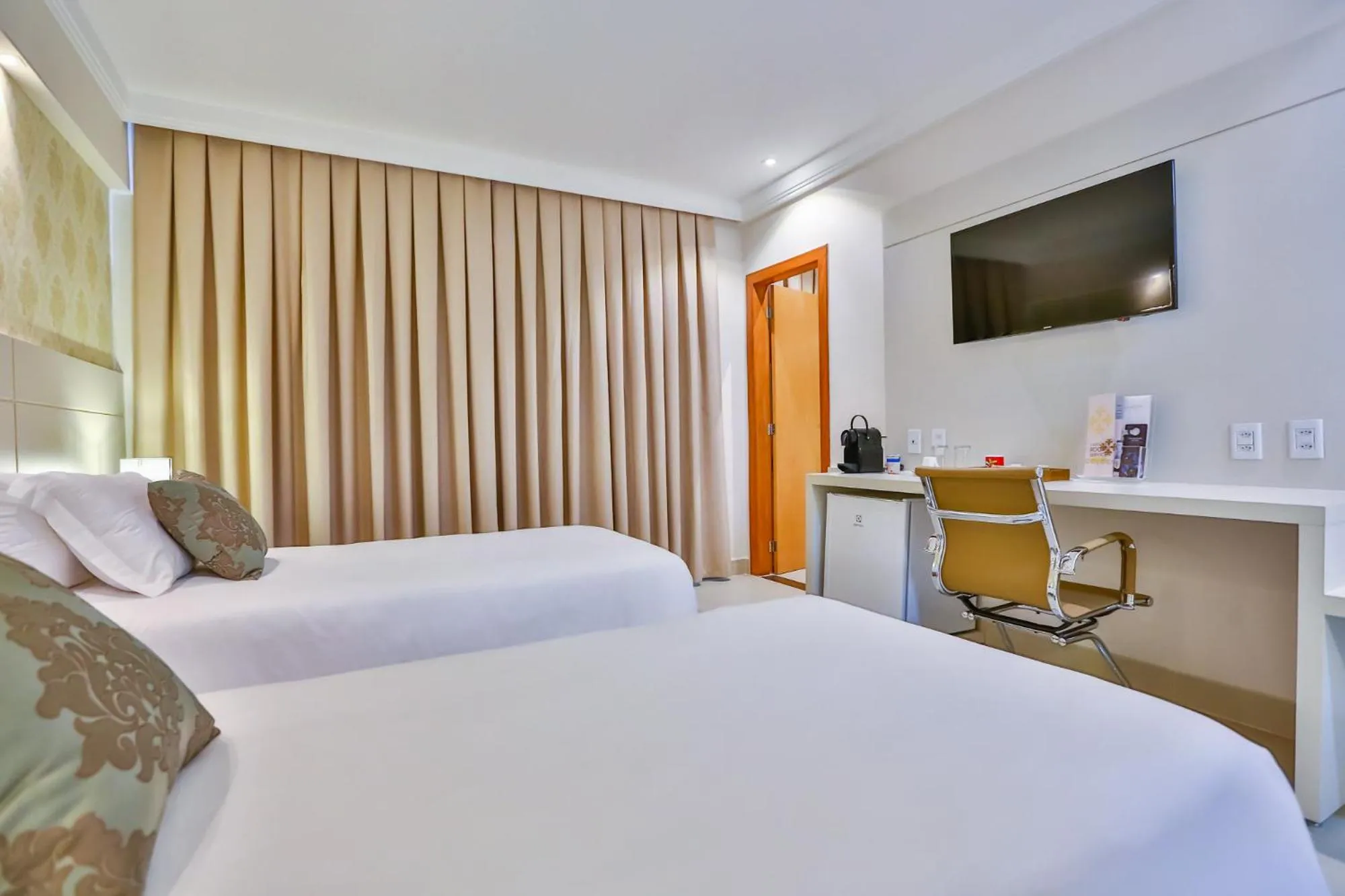 Bed in Golden Lis Hotel Boutique