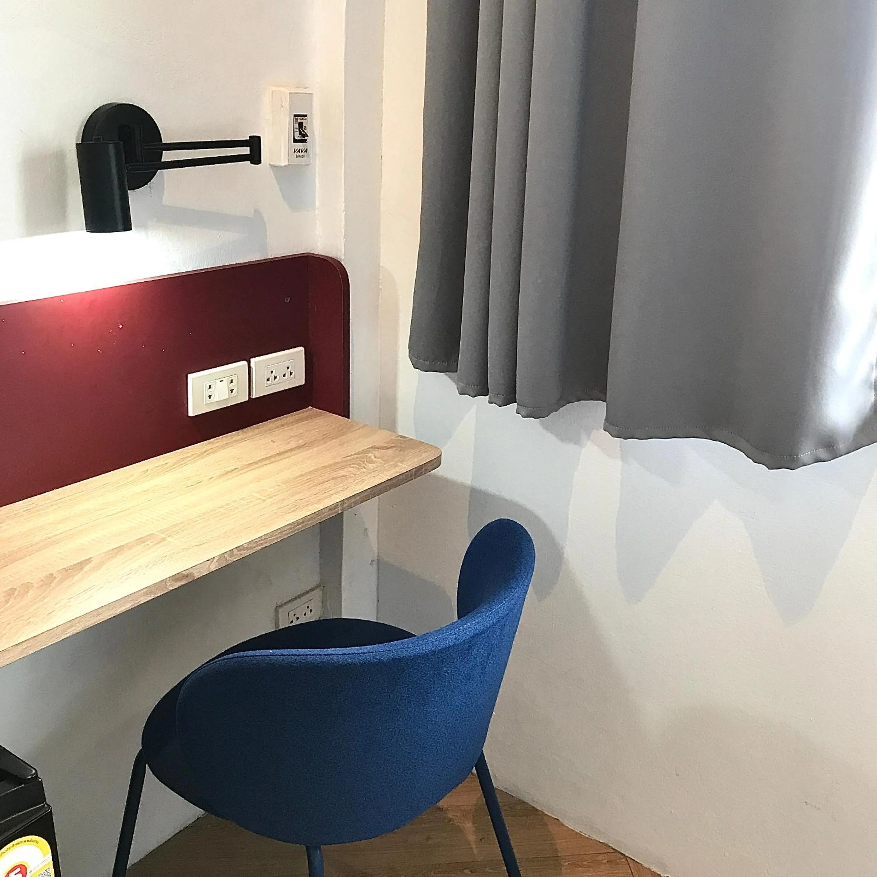 Seating area in Beige Poshtels + Netflix