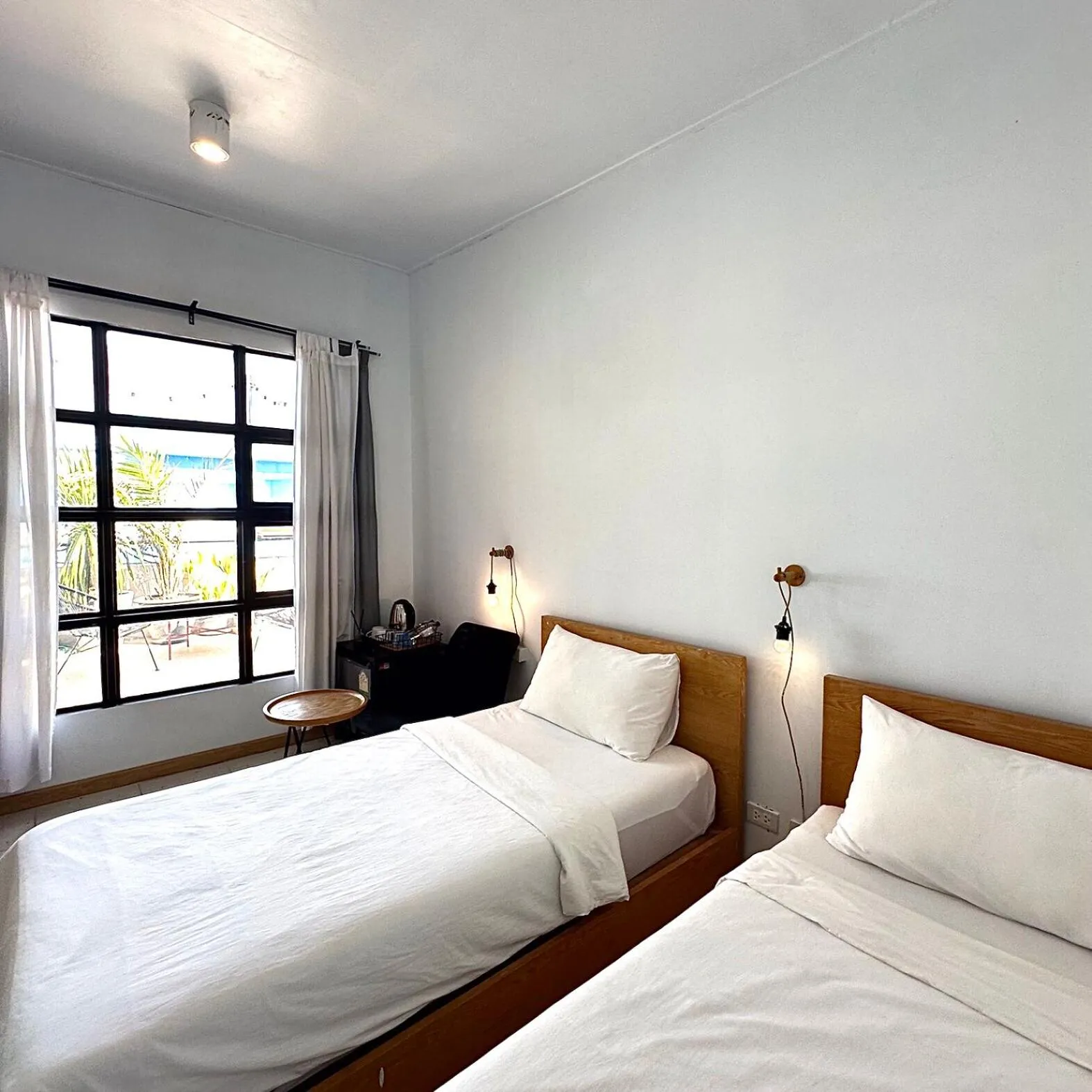 Bed in Beige Poshtels + Netflix