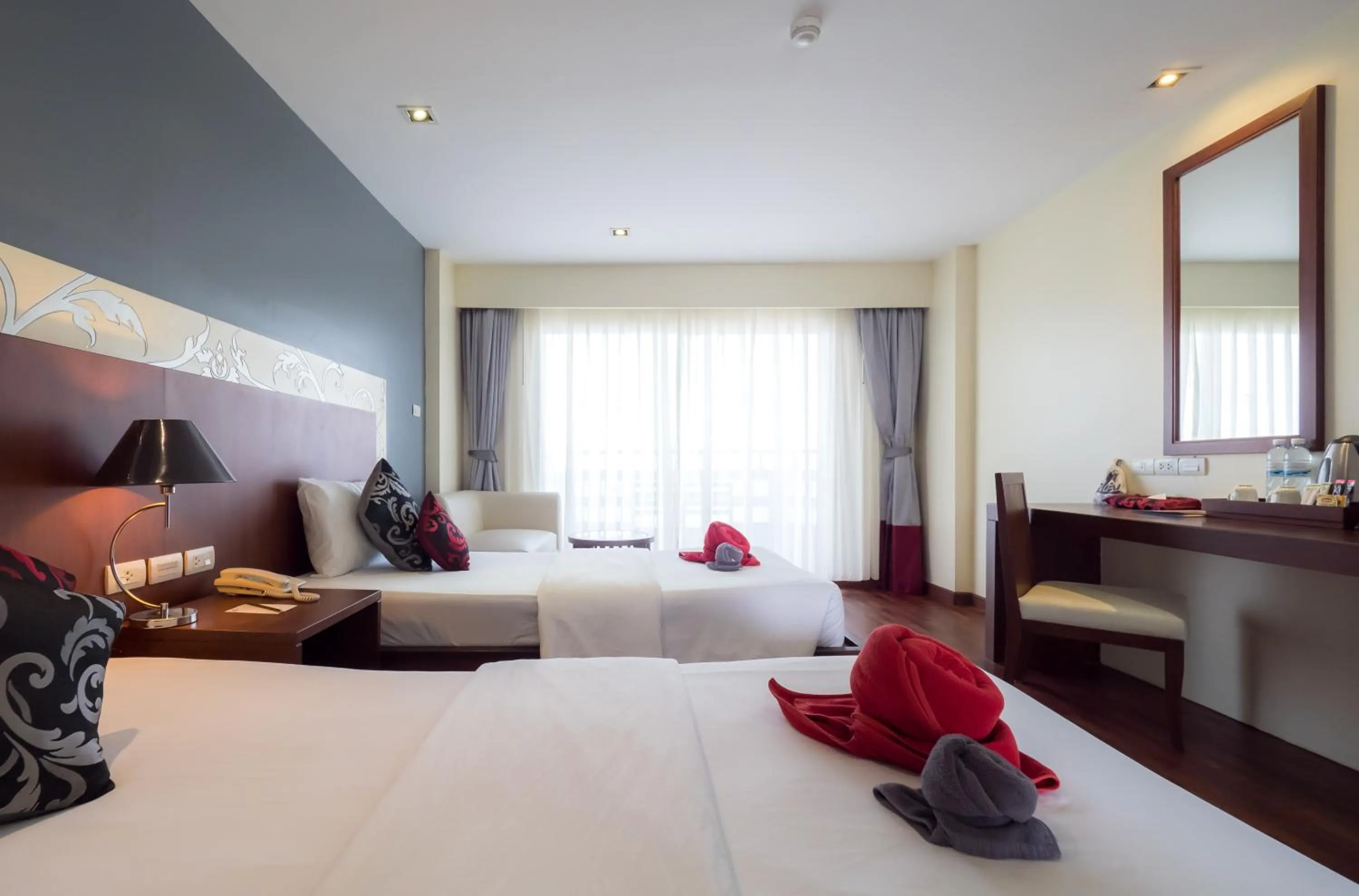 Bed in Grand Jomtien Palace Hotel - SHA Extra Plus